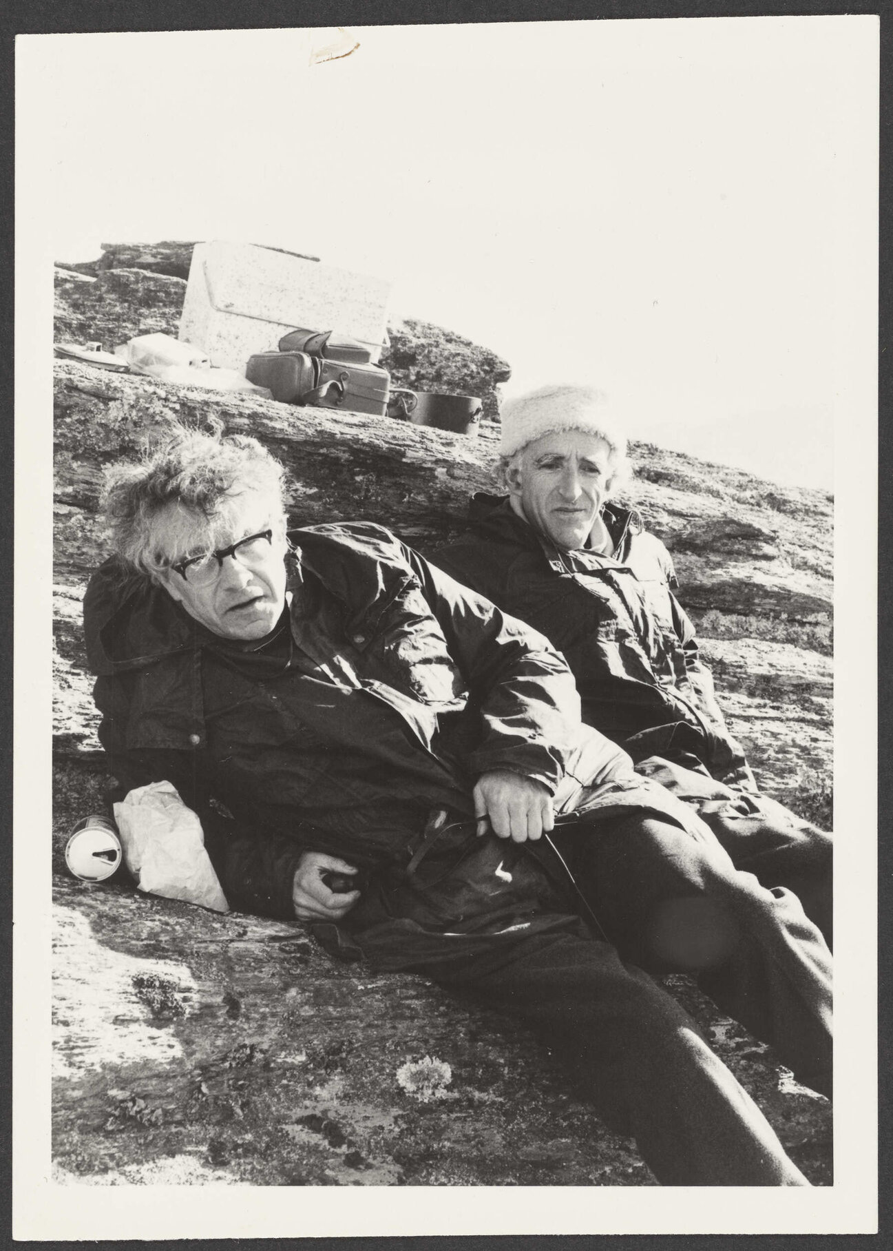 Charles and another man resting on Mt Misery