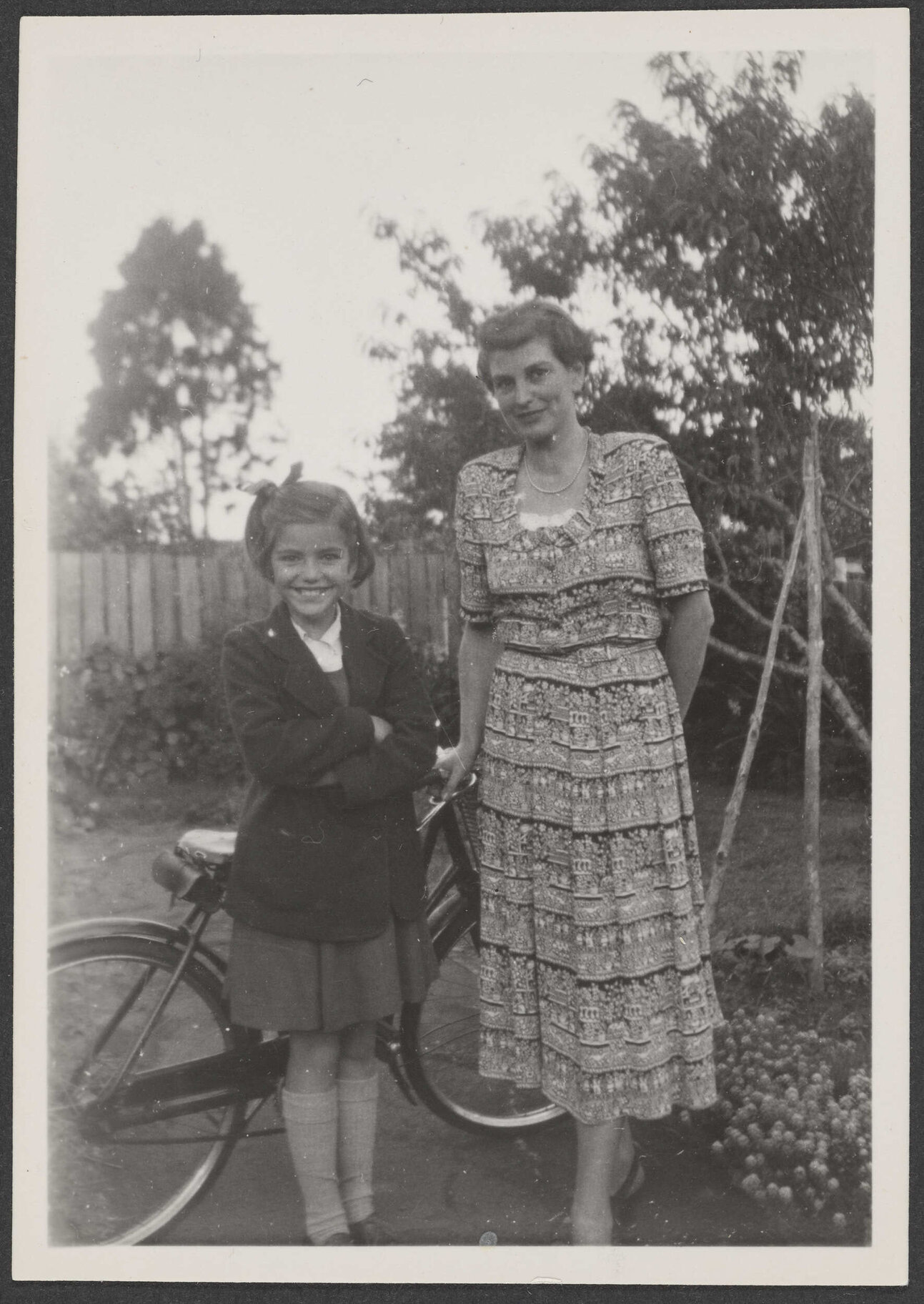 Rose and Jannabelle Archdall in a garden