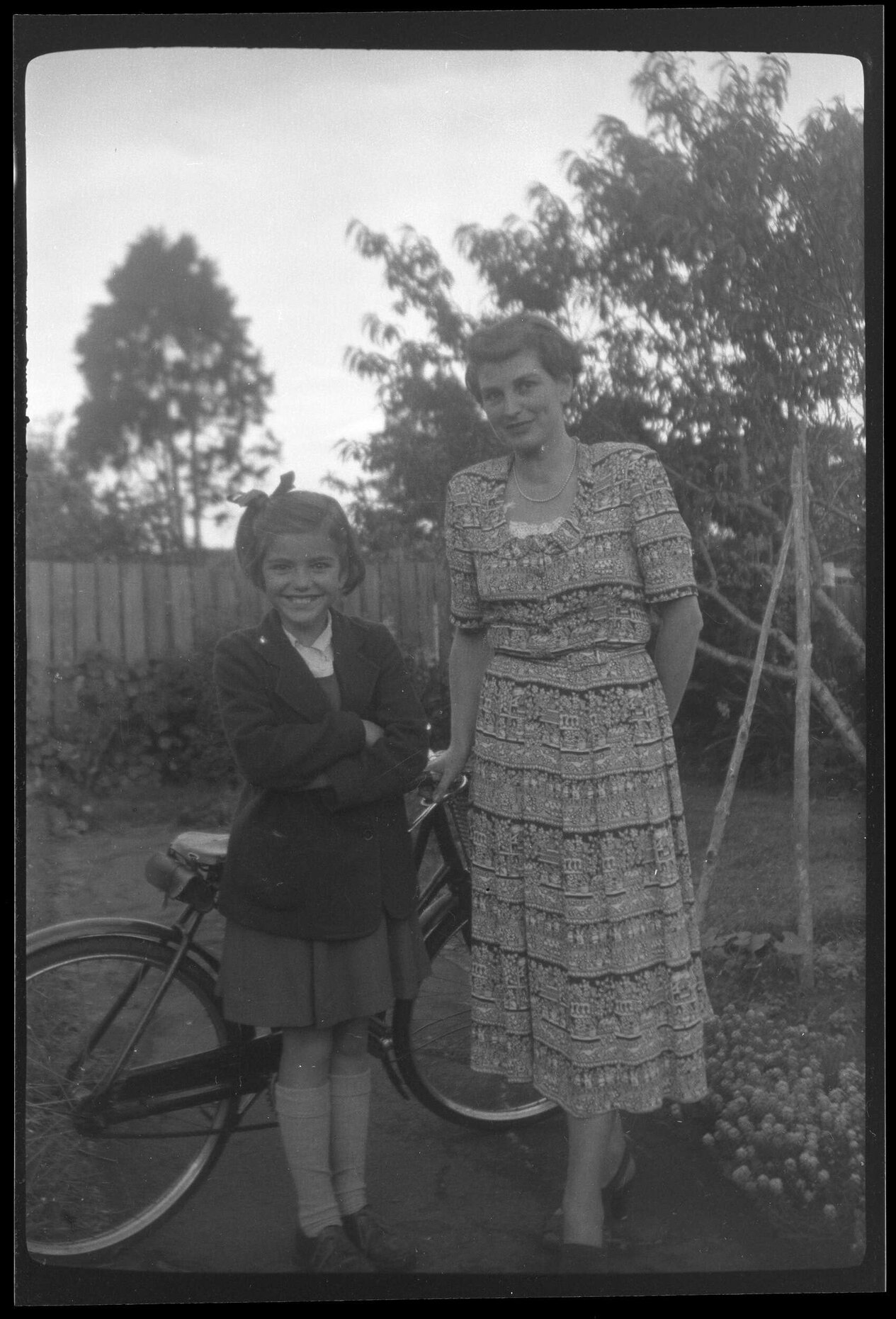 Rose and Jannabelle Archdall in a garden