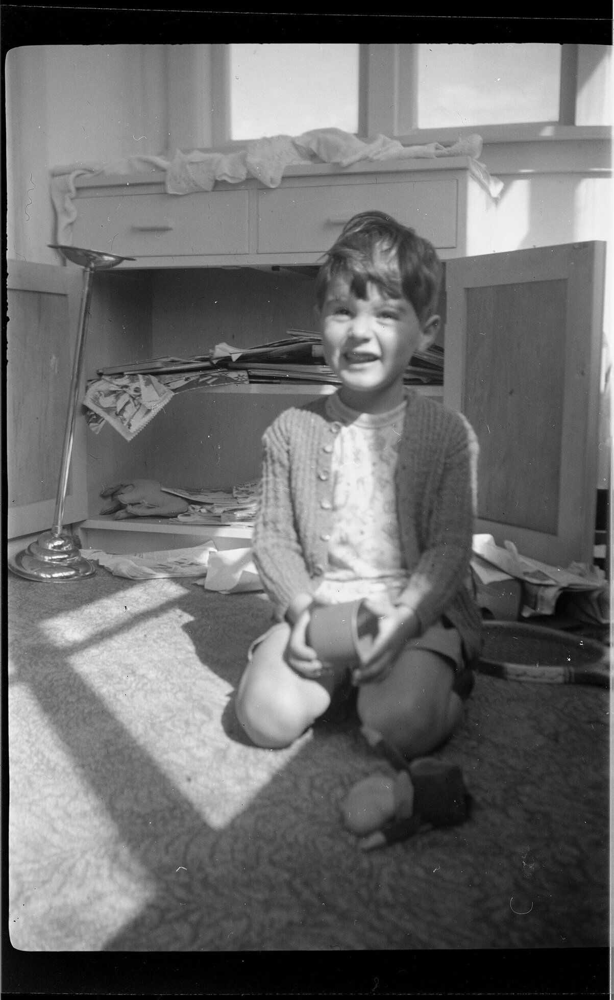 Child sitting on floor