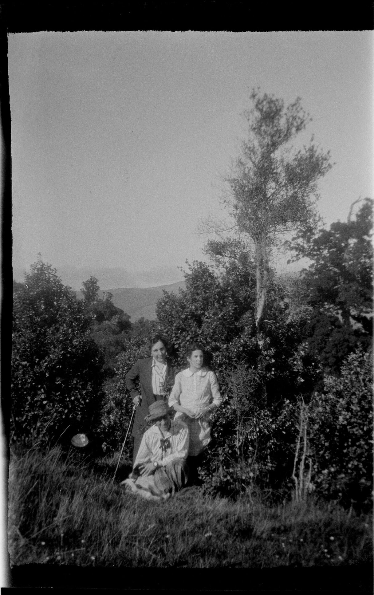 Two women and girl in outdoor setting