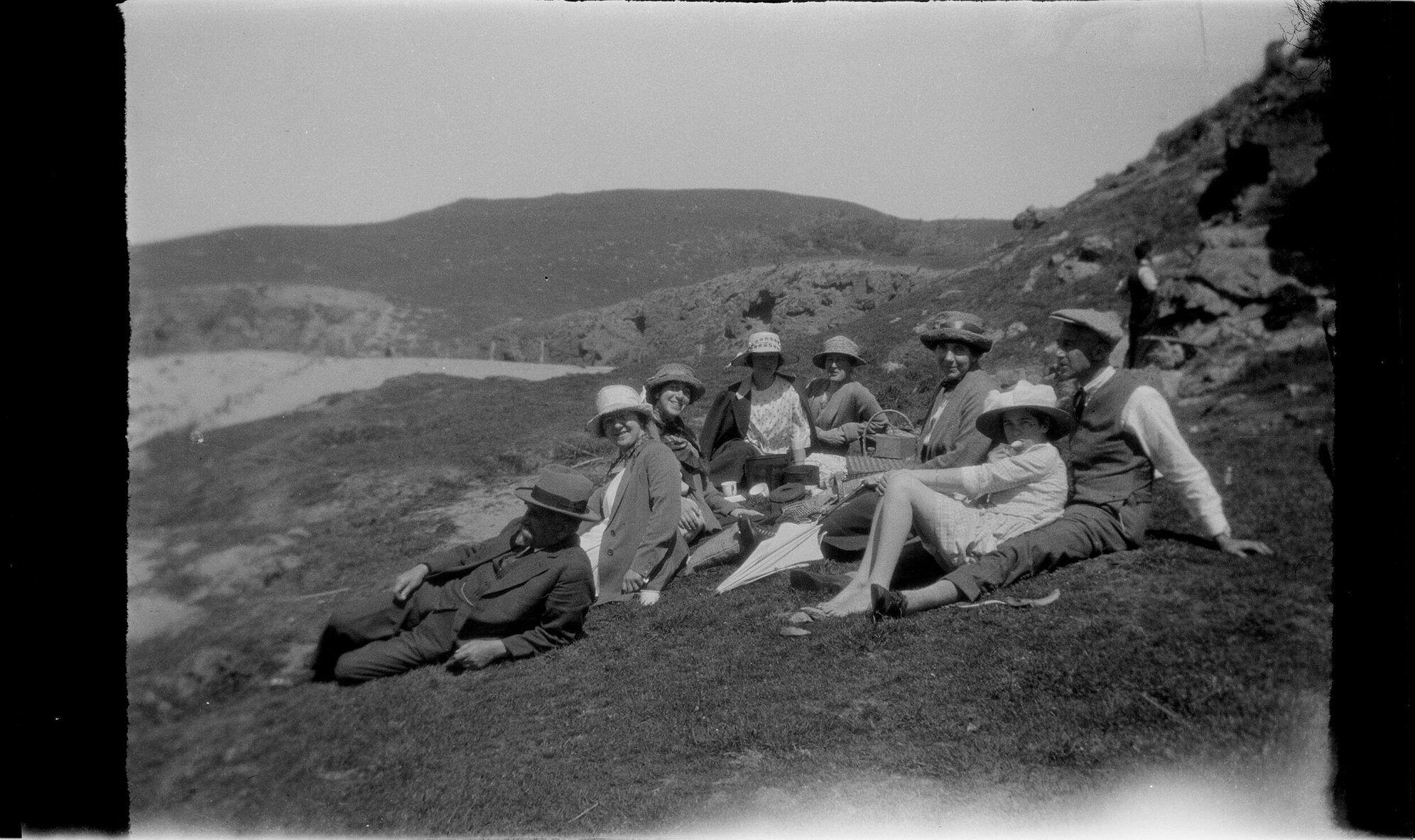 Picnic group above a beach