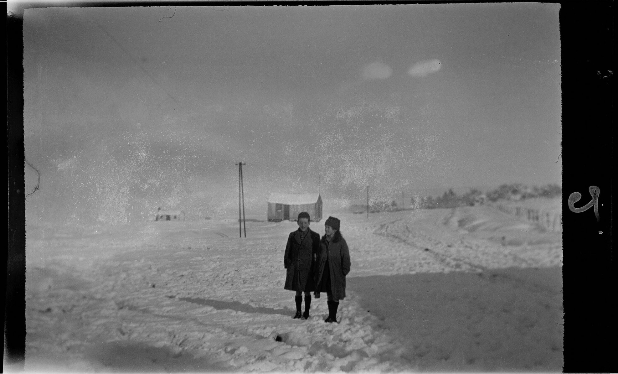 Charles and Lesley Brasch [?] in a snowy rural setting