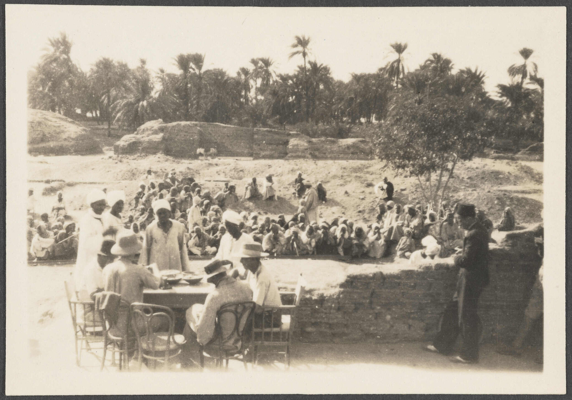 Workers waiting for their pay to be dealt out