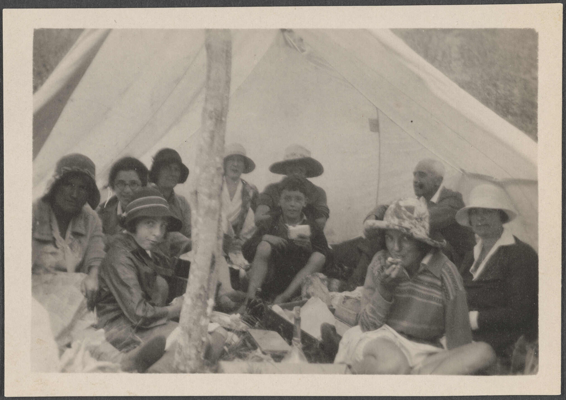 Group of people in a tent at Pipikaretu