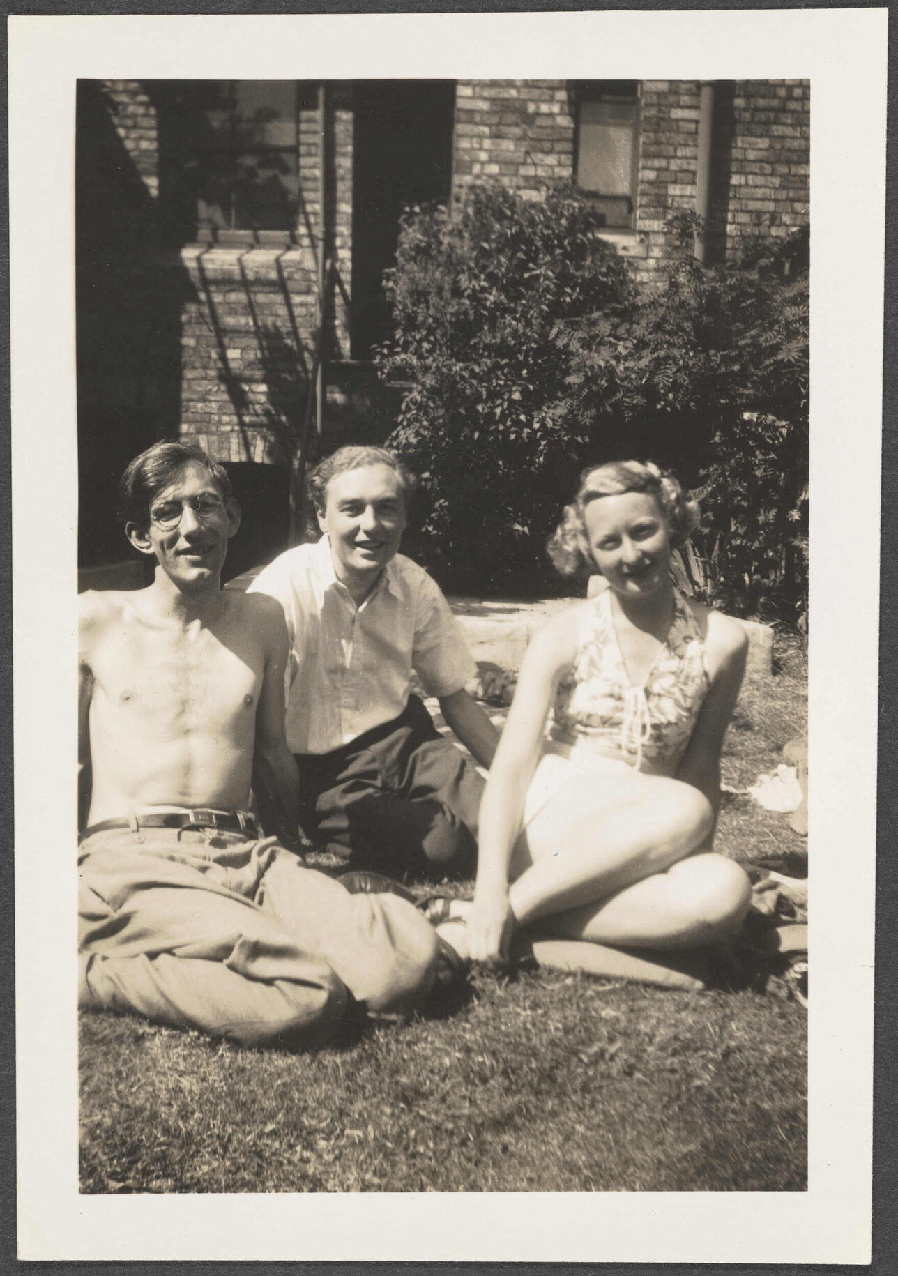 Jack and Edith Bennett on lawn with unidentified man