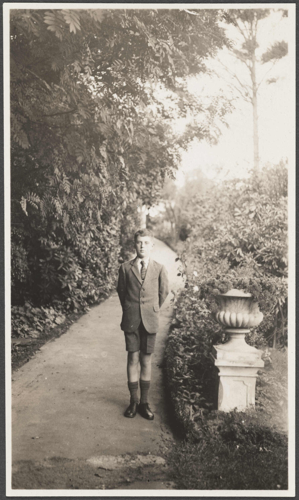 'Peter standing very straight in the garden, 1932-1933' 