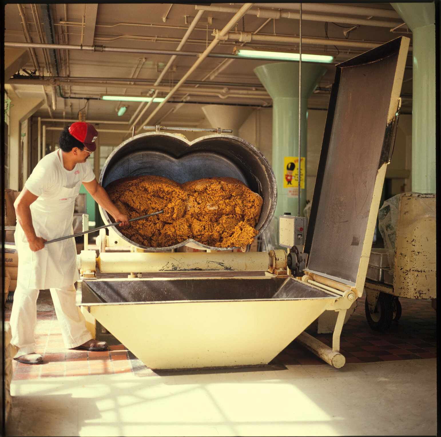 Cadbury machinery operator with Chocolate Chippie mixture