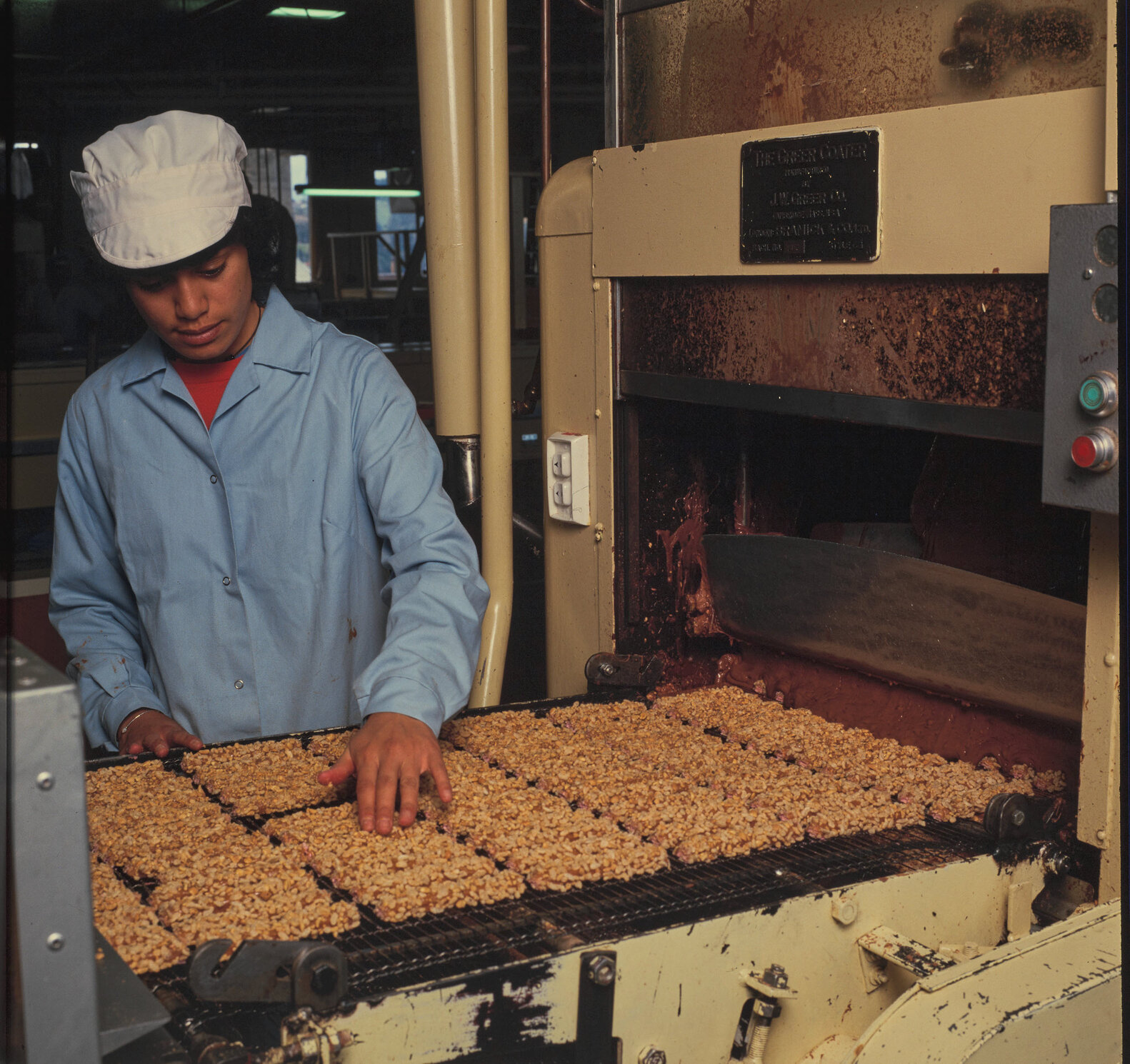 Machinery operator with Cadbury Picnic bars