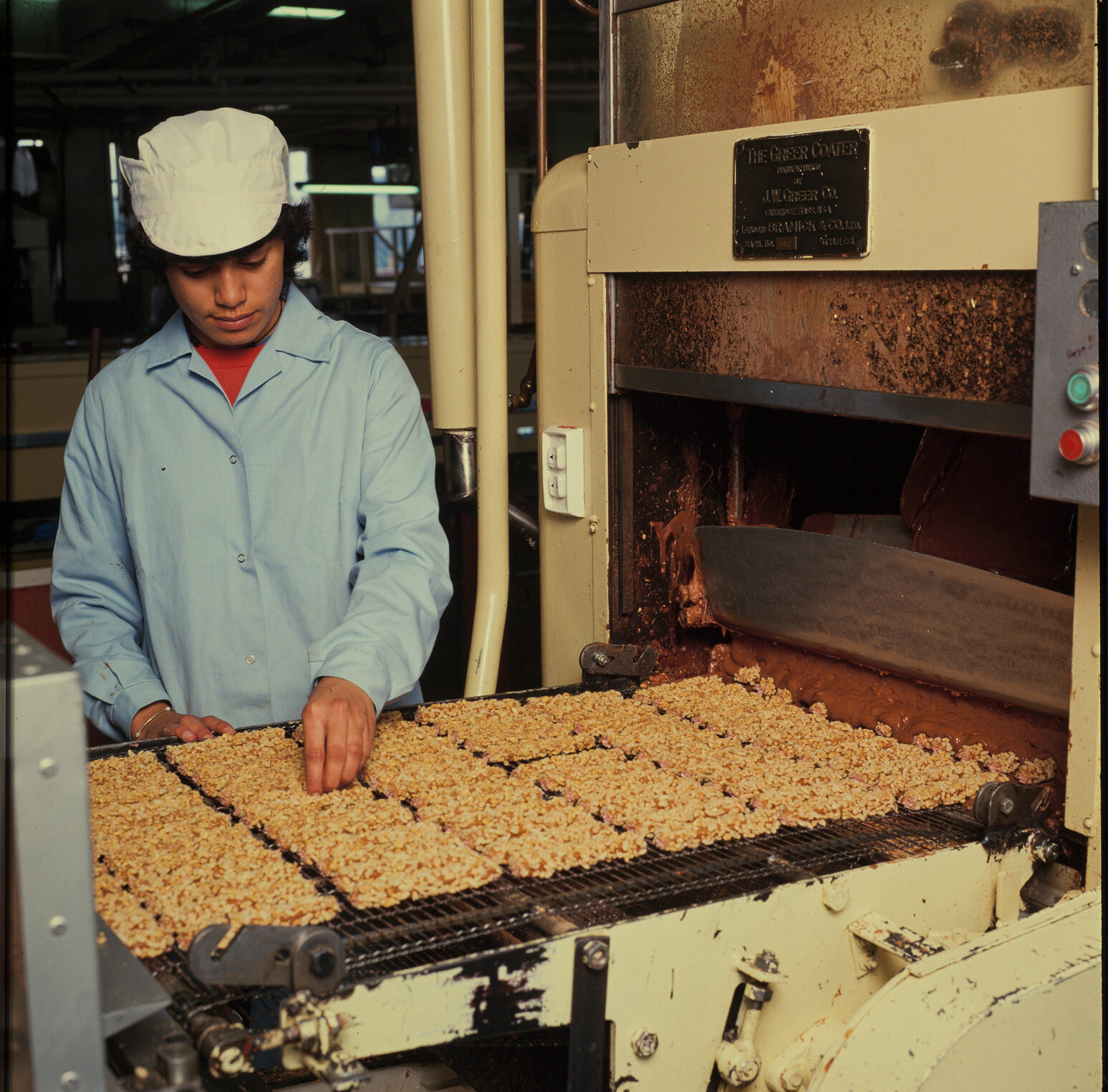 Machinery operator with Cadbury Picnic bars