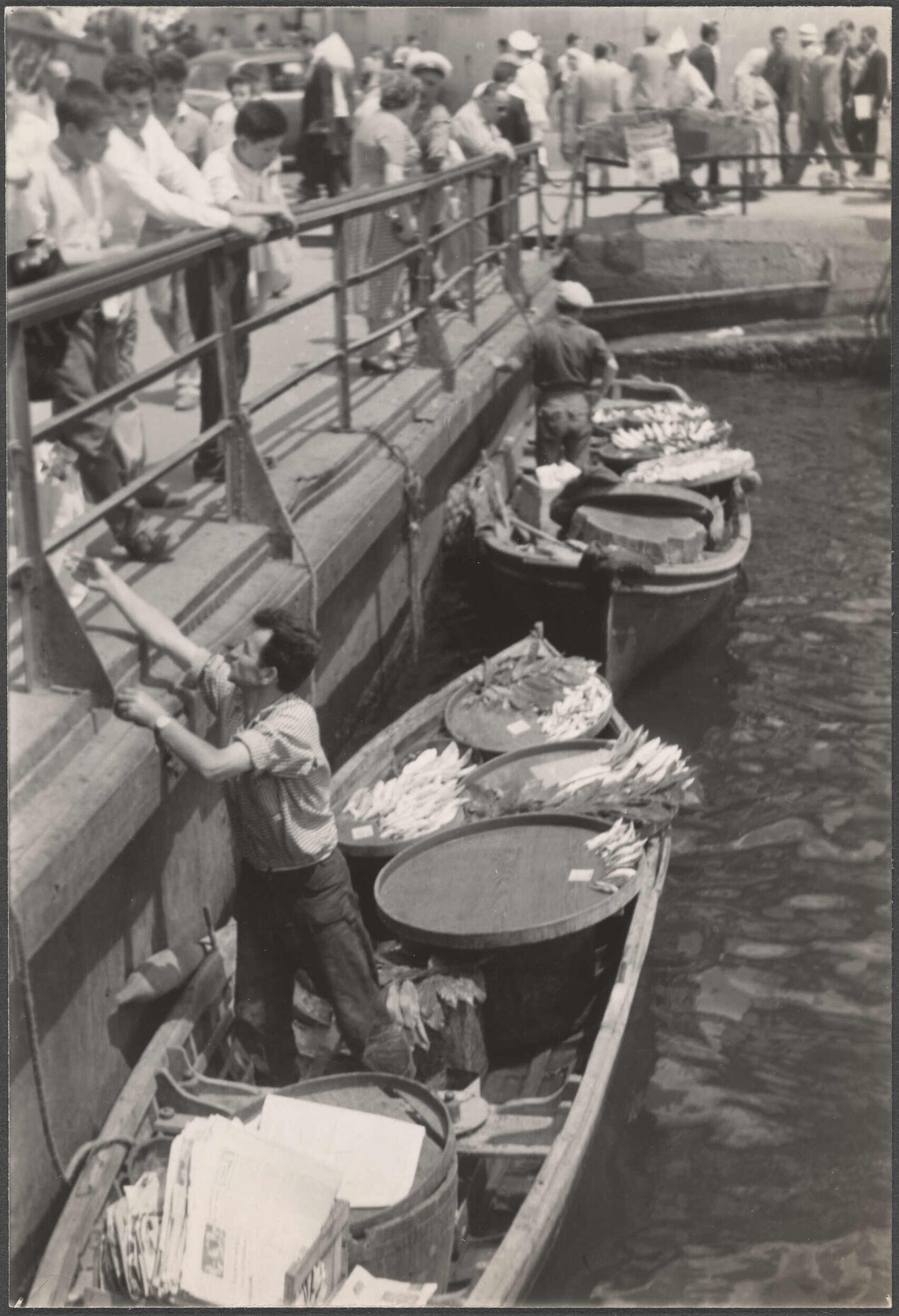 Selling fresh fish alongside Galata Bridge