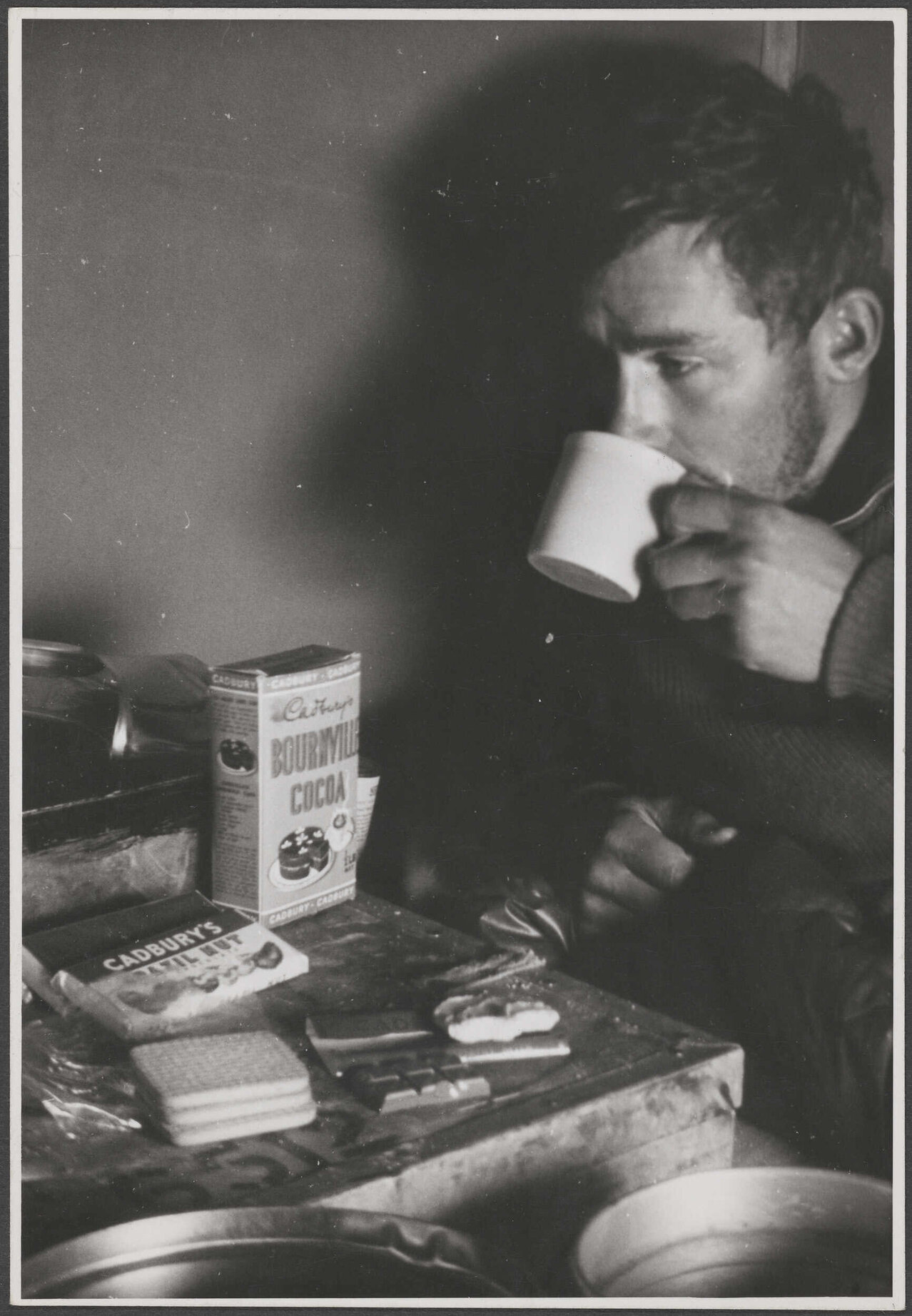 Man with cocoa and chocolate