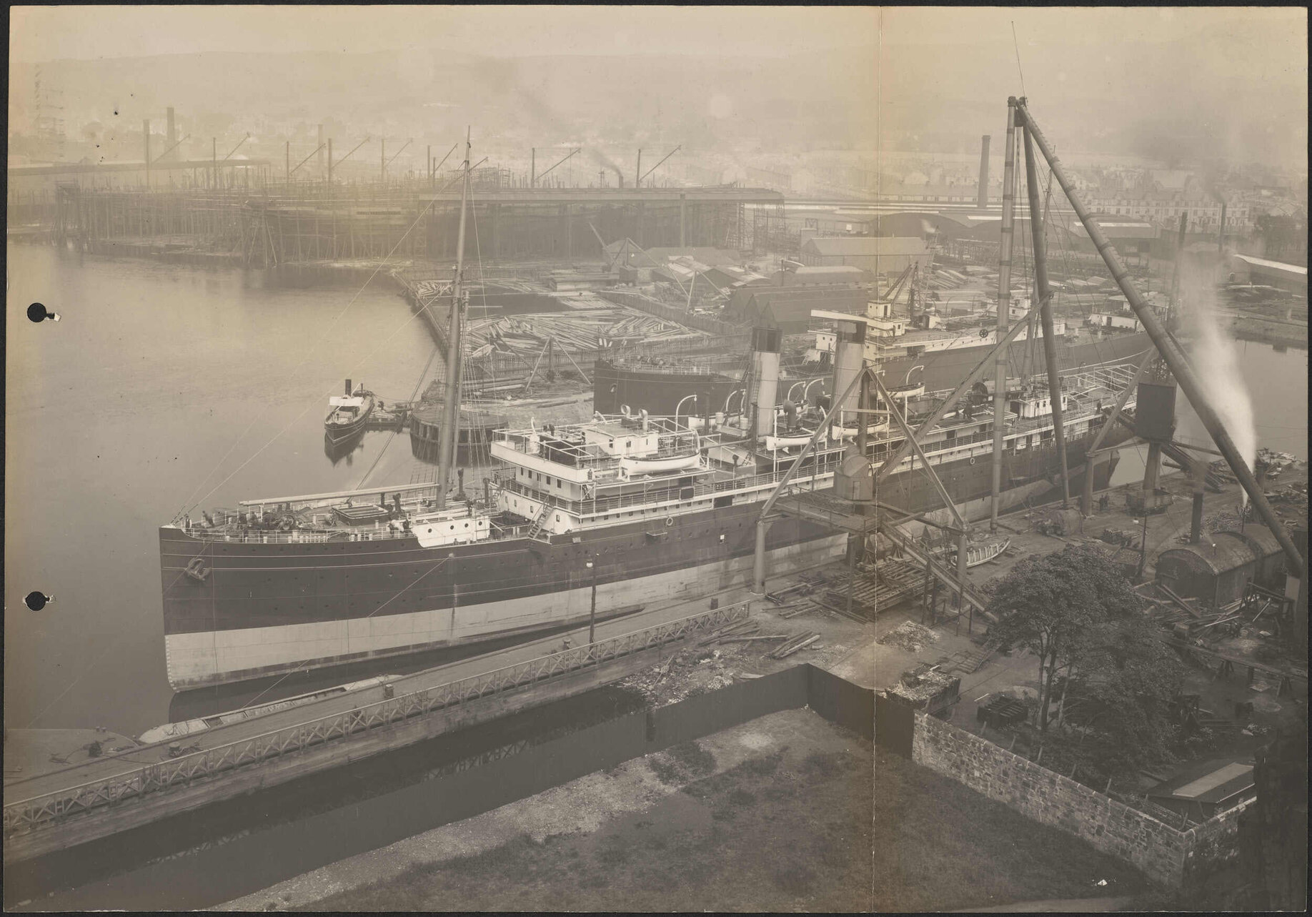 Maheno lying alongside, Denny's yard