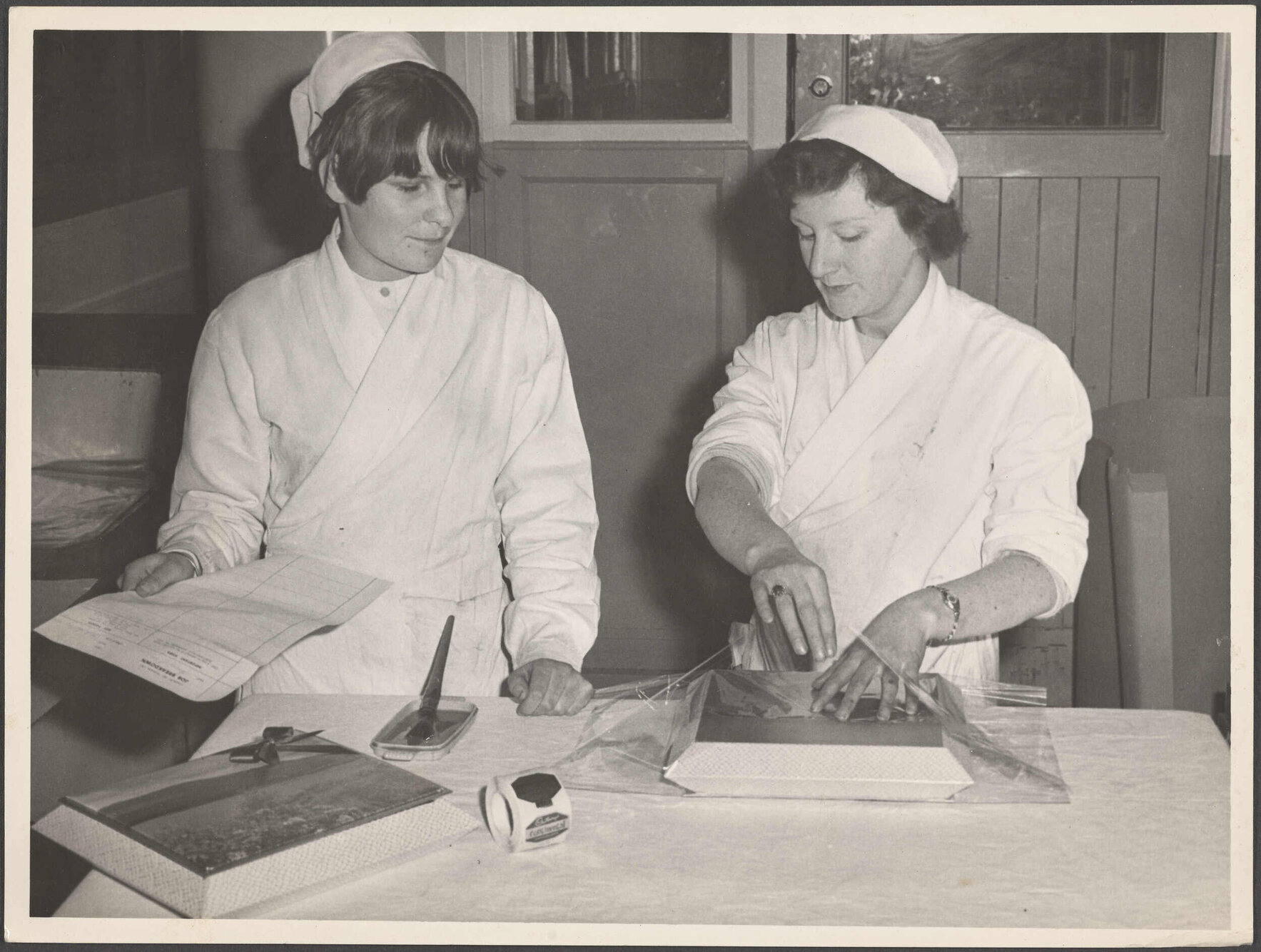 Packing a box of Continental chocolates