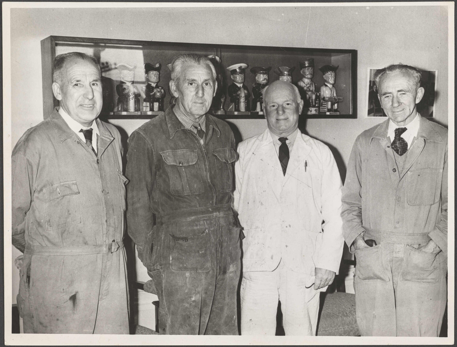 Jim Moffat, Jim Wilson, Ernie Gilchrist and Charlie McLean in the Chairman's Office on the eve of their retirement