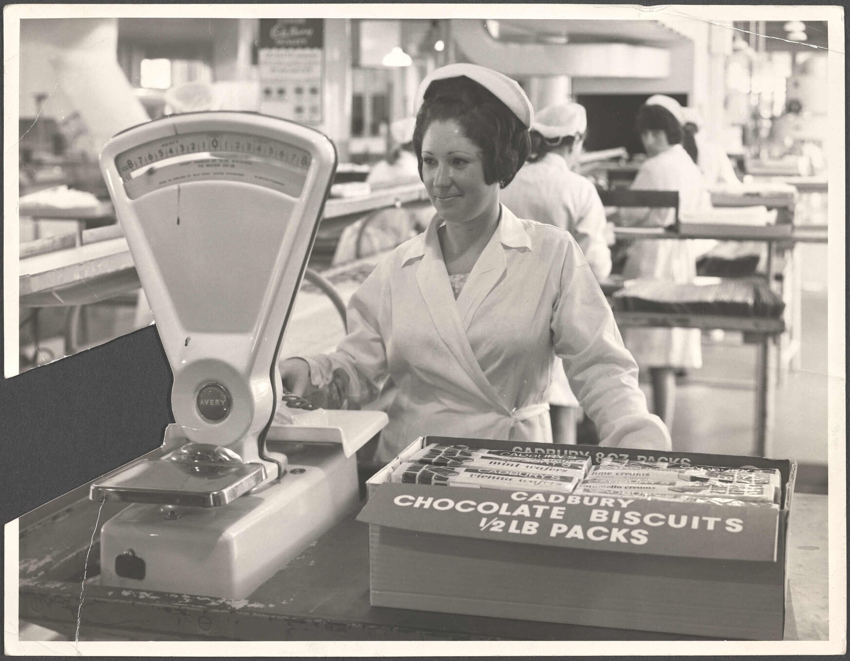 Raelene O'Neill packing chocolate biscuits for export to Australia