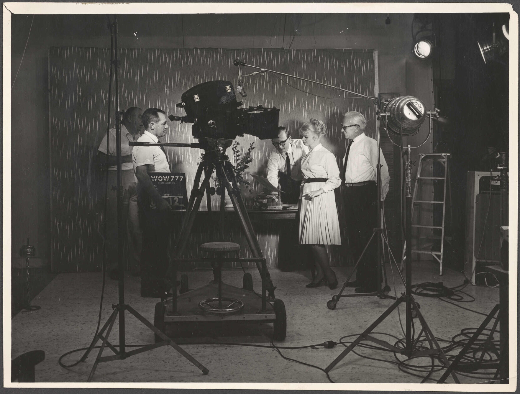 'In a T.V. Production Studio in Auckland during production of commercials for Hudson's biscuits'