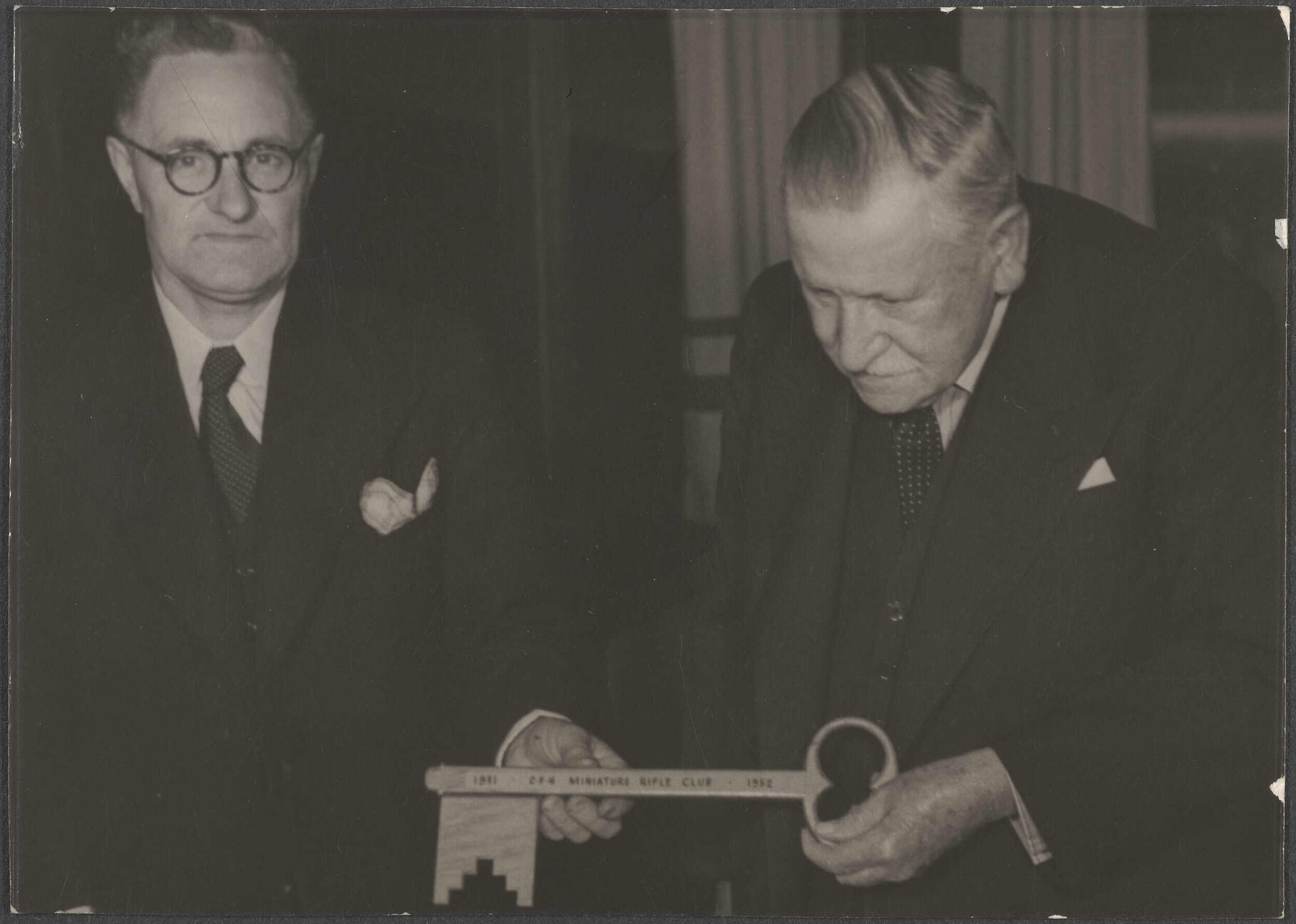 R.J.D. Hudson handing Richard Hudson Senior the 'key' of the C.F.H. Miniature Rifle Club