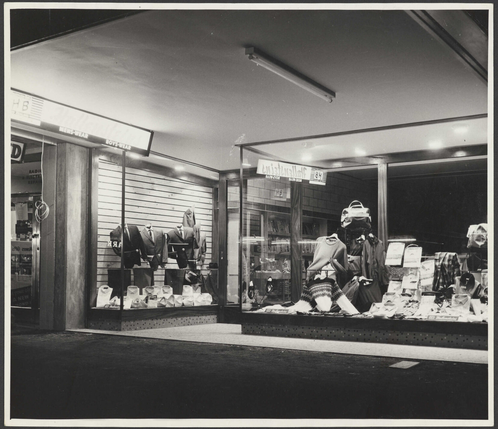 Hallensteins storefront, Papakura, at night