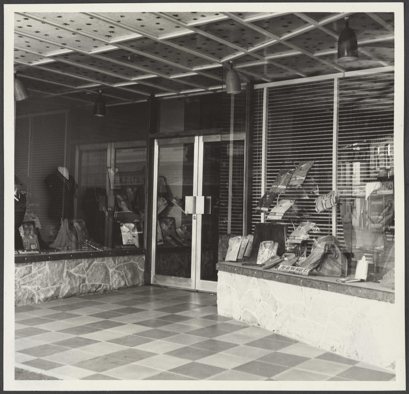 Display windows and entrance at Hallensteins, Hāwera
