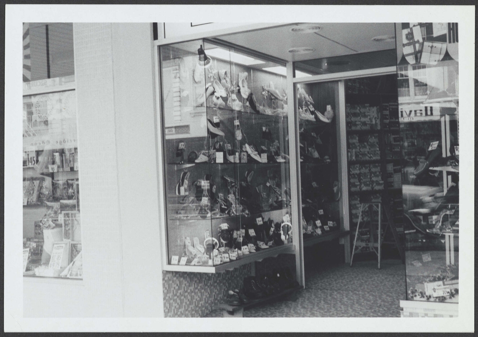 Window display of shoes at Hallensteins branch premises, Hamilton