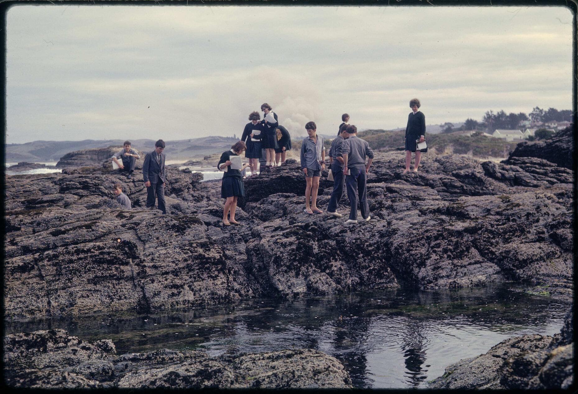 Kaikorai Valley High School pupils on rocks at Brighton