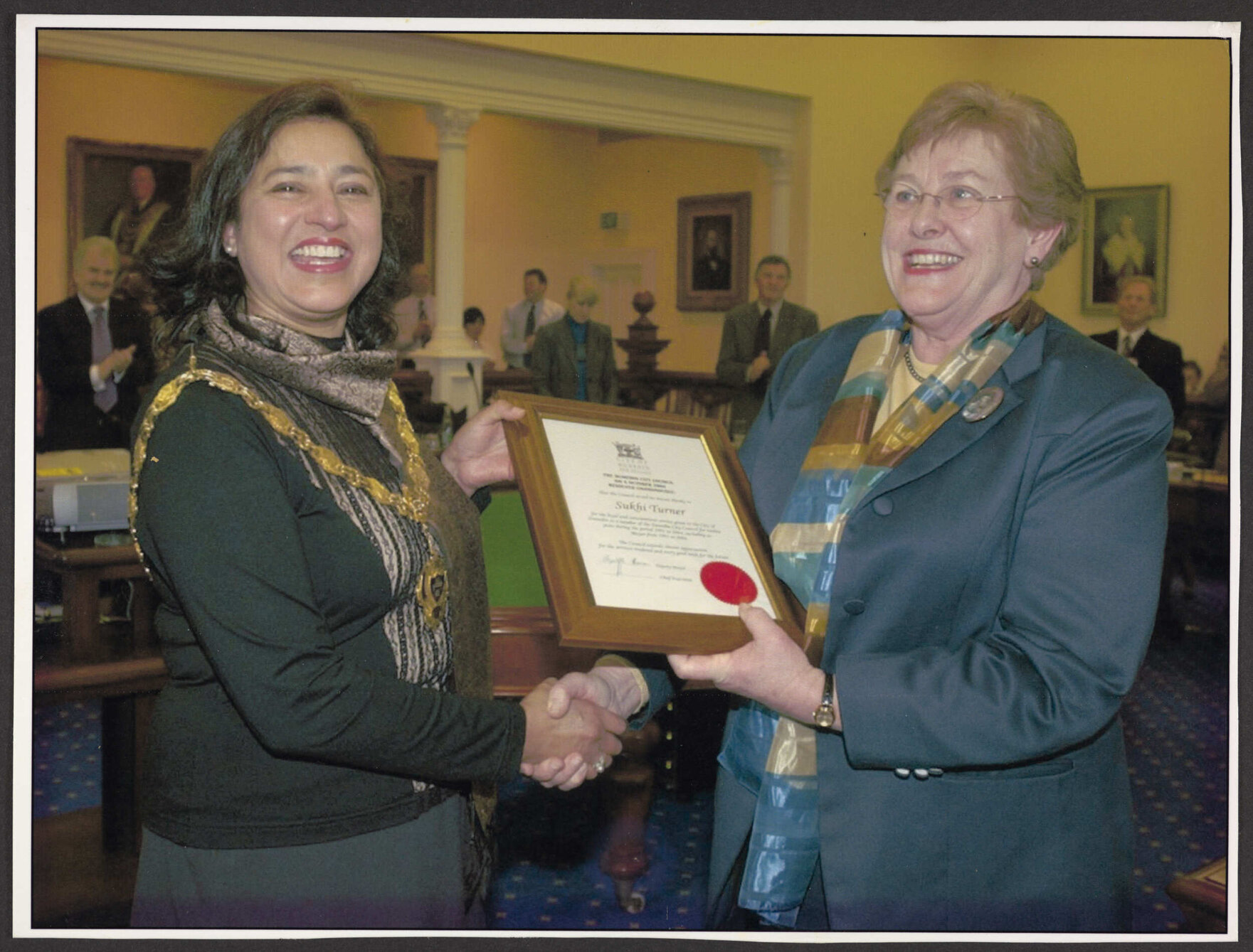 Presentation to Sukhi Turner by Dame Elizabeth Hanan on behalf of the Dunedin City Council