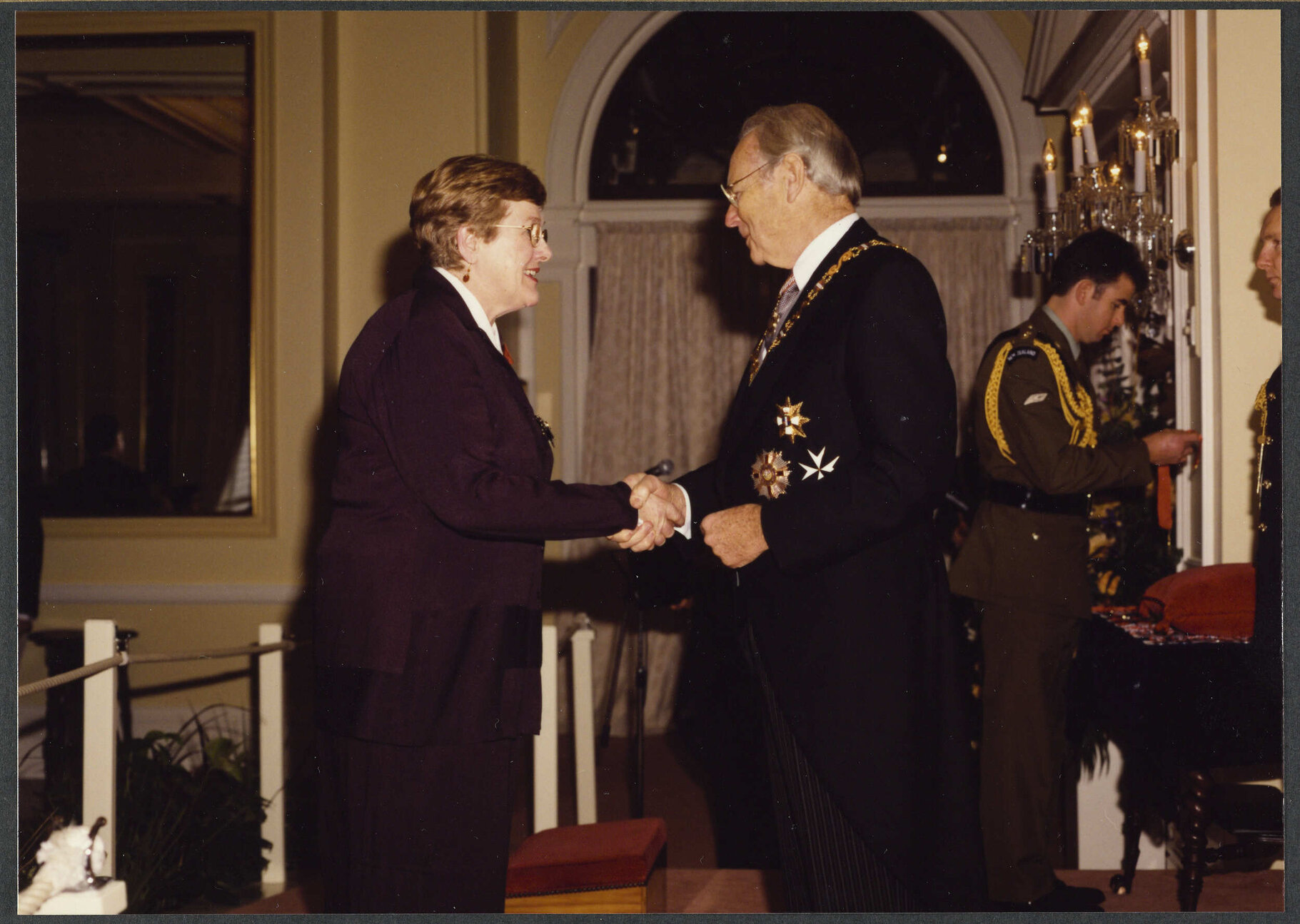 Investiture of Dame Elizabeth Hanan by Sir Michael Hardie Boys at Government House, Wellington