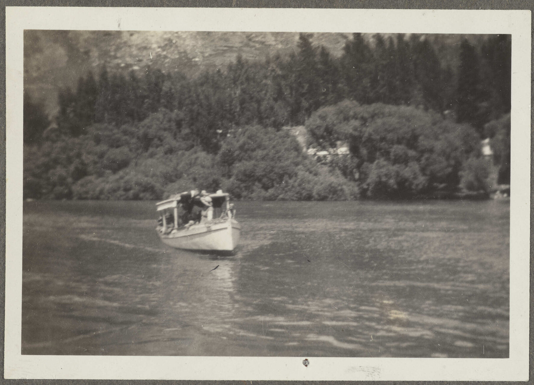 Boat sailing on lake