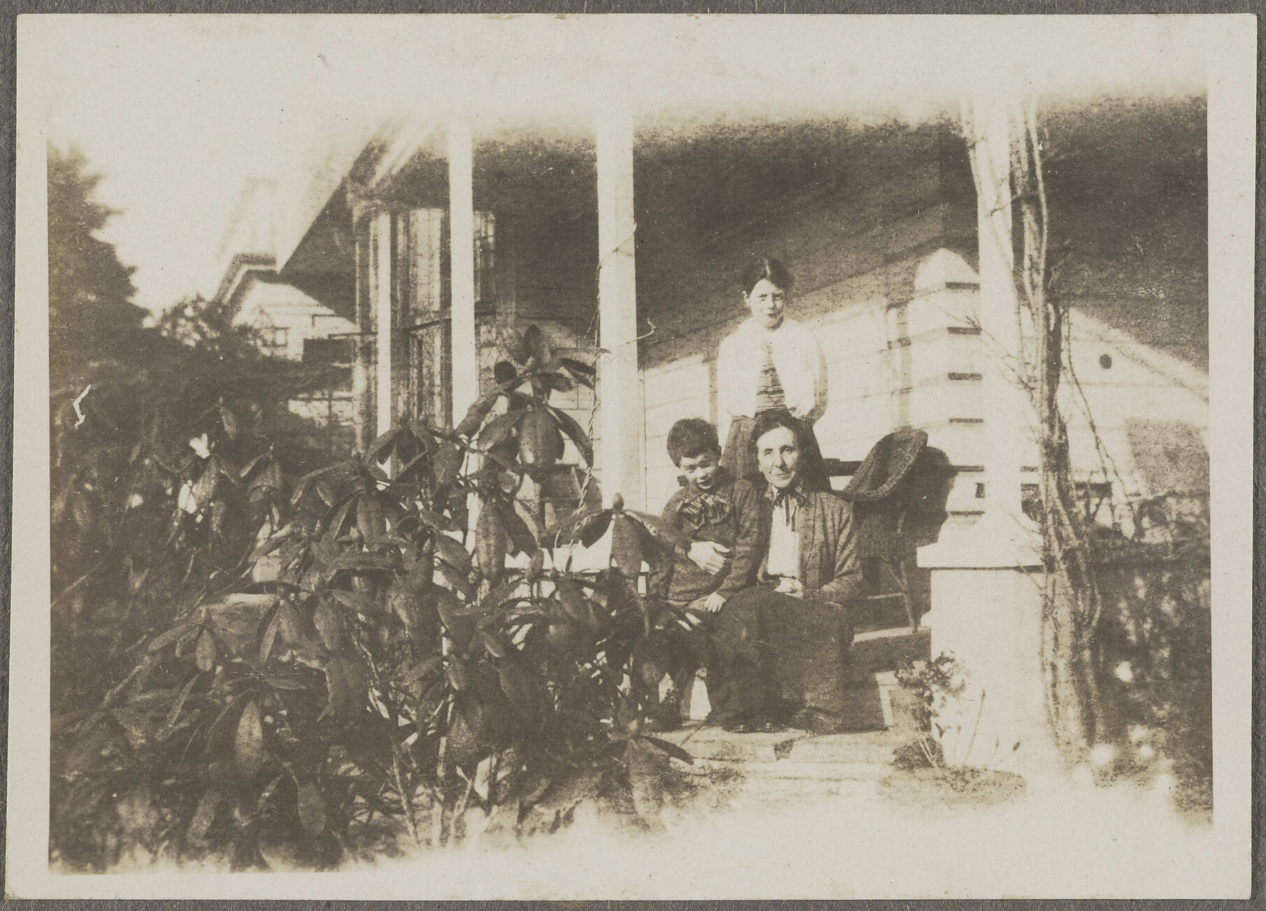 Unidentified woman and two children