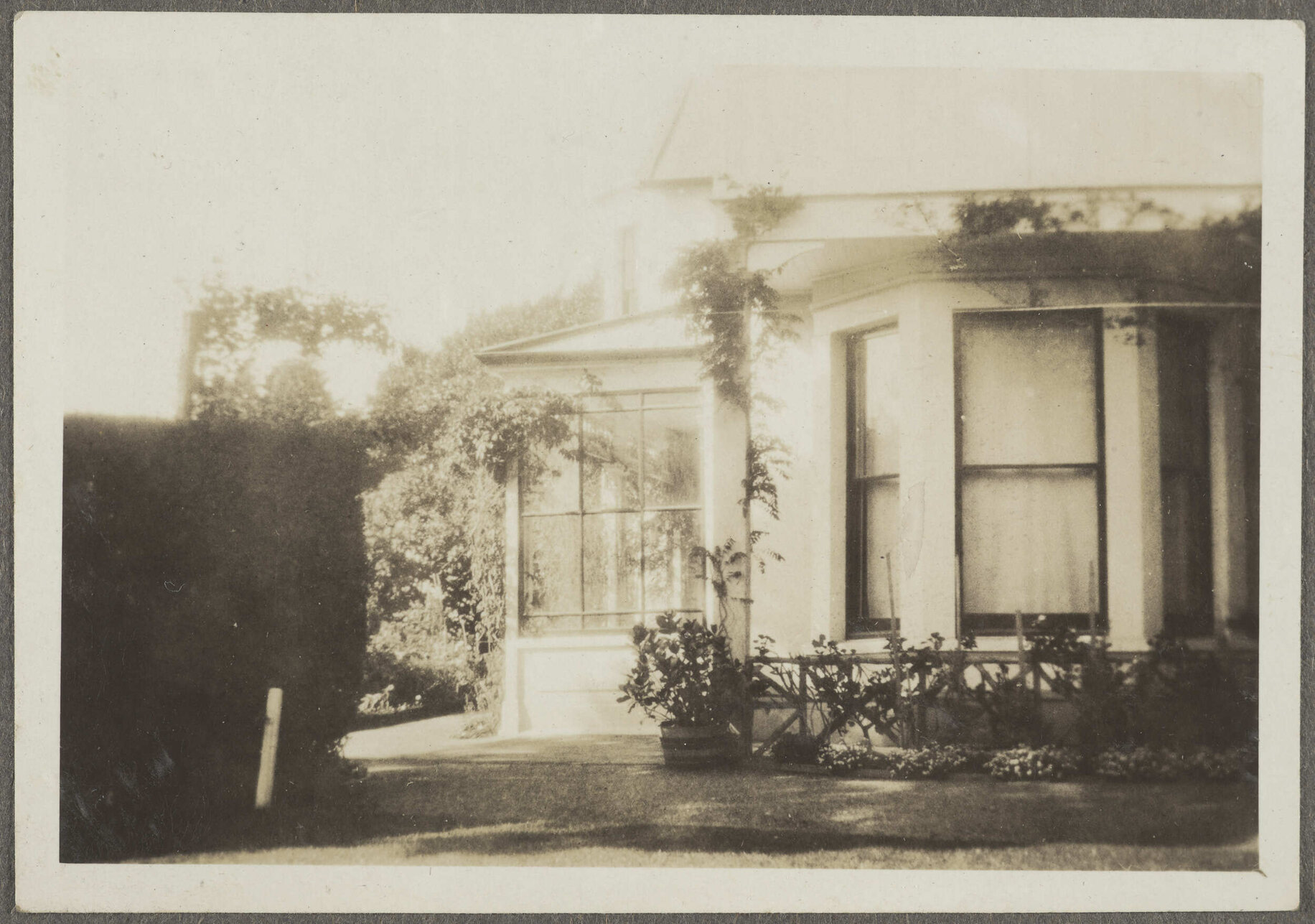 Side of house with large windows