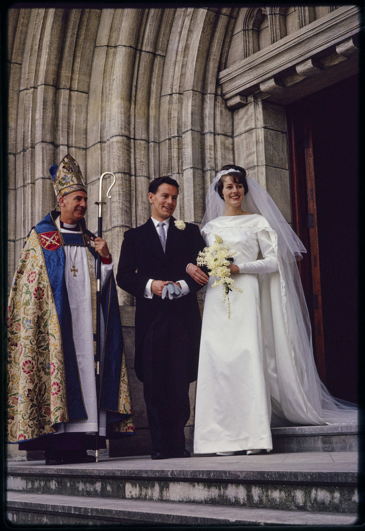 Leslie and Patricia Holborow with the Most Rev. Allen Johnston  on their wedding day