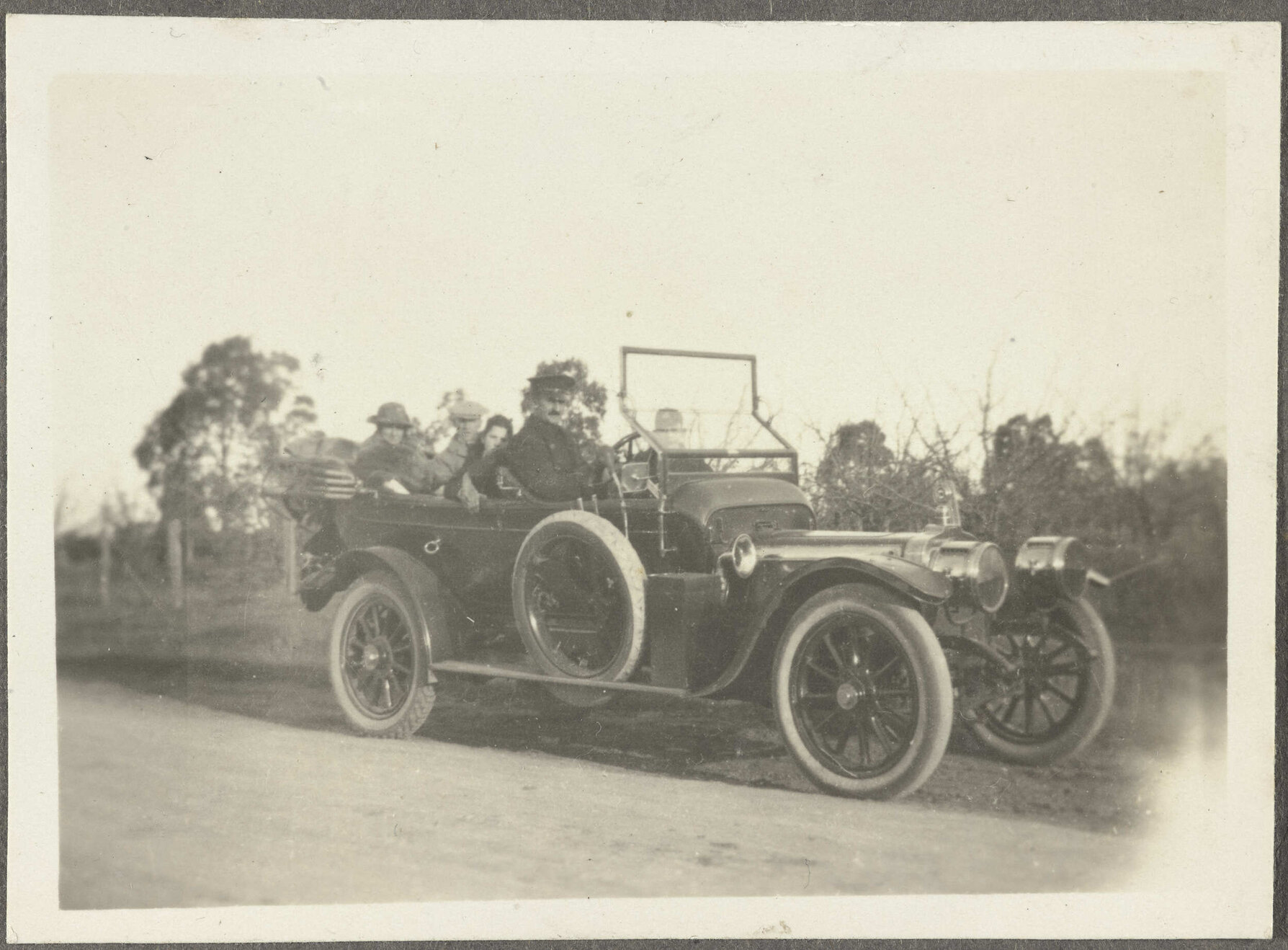Five unidentified people in a car