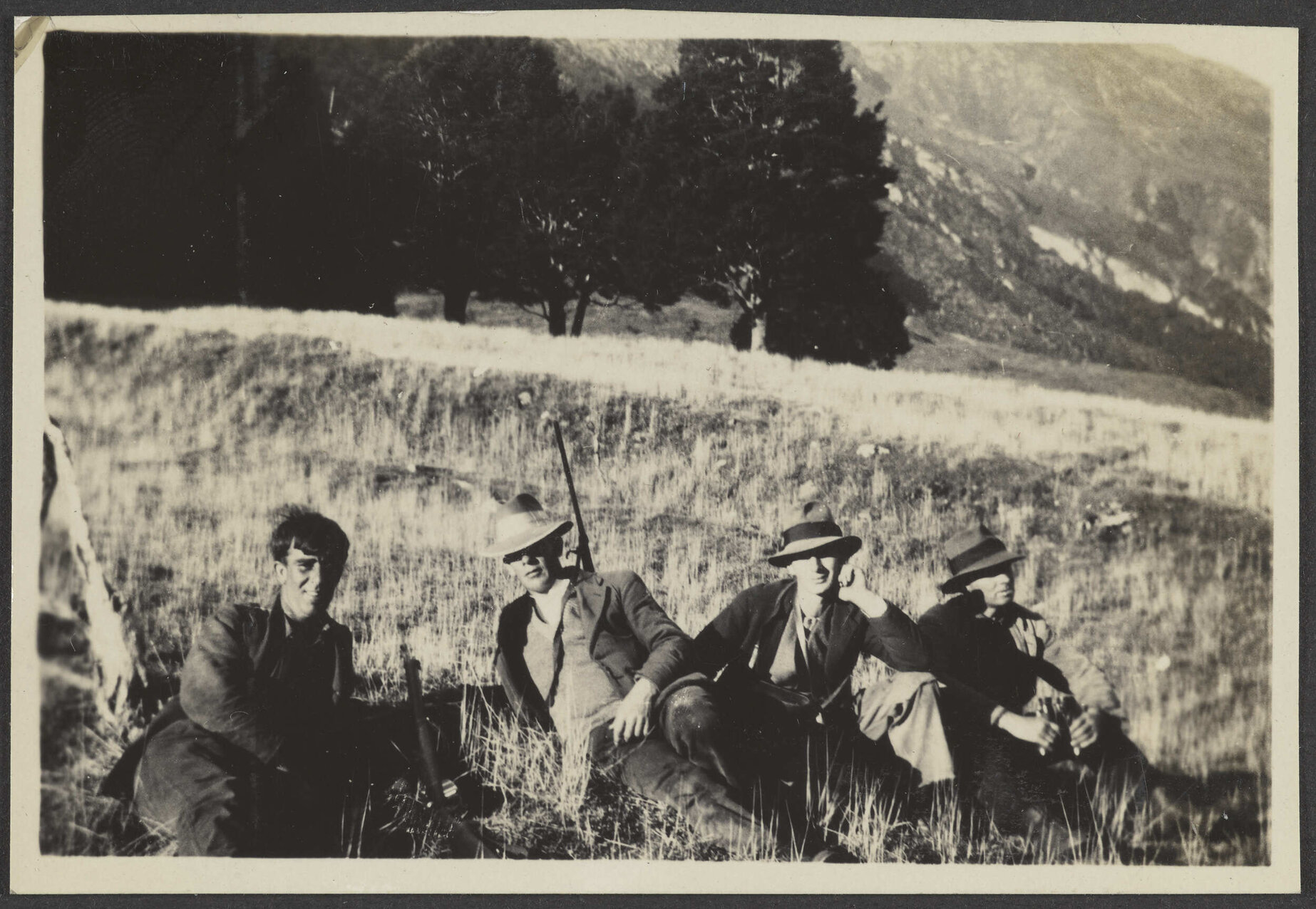[Hyam Brasch] and [Fred Freeman] and two unidentified men resting after hunting