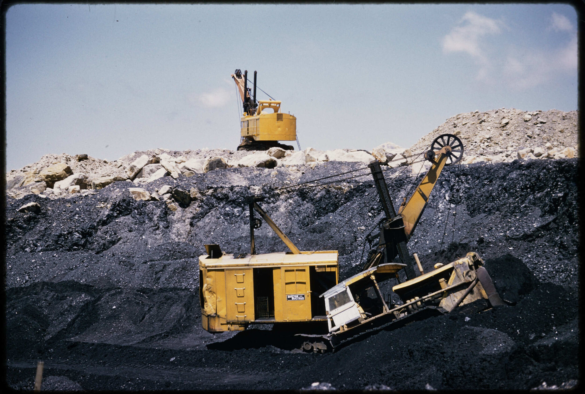 Open cast coal mine. 'Returning the surplus load'.