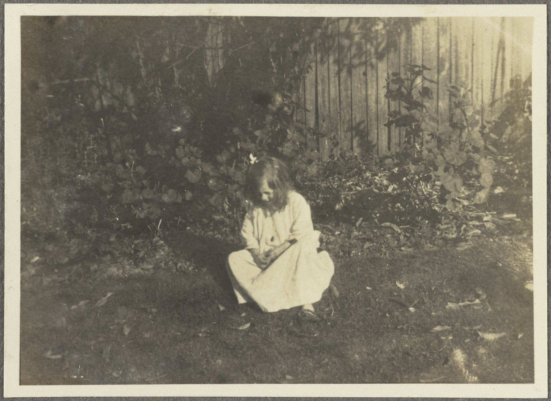 [Elespie Forsyth] sitting on lawn