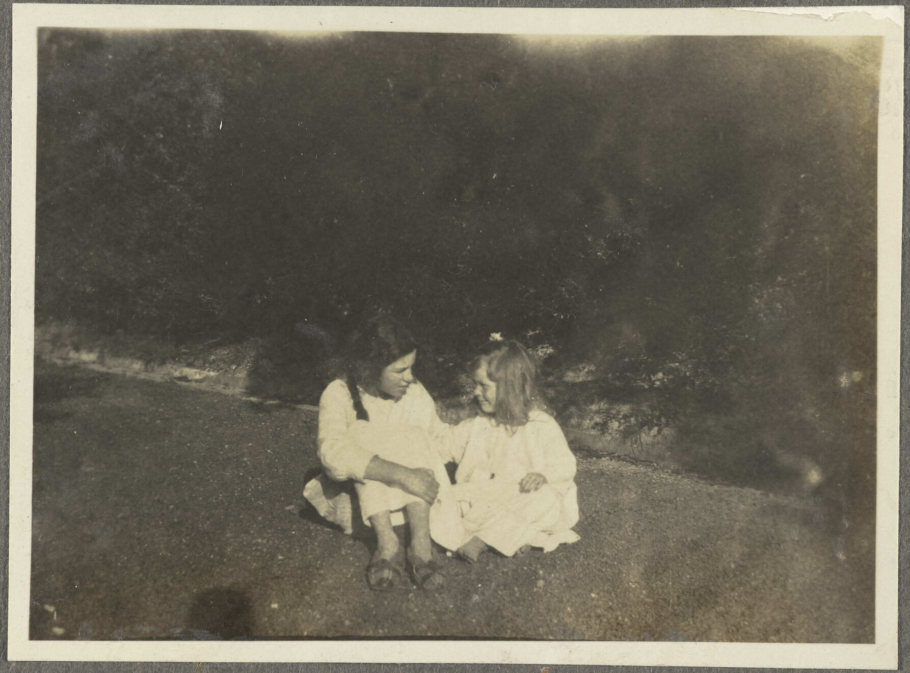 Lesley Brasch and [Elespie Forsyth] sitting on grass