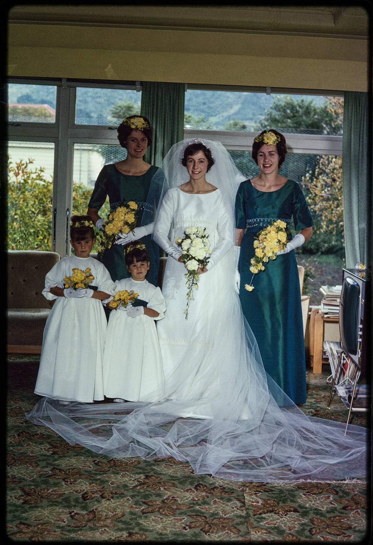 Jennifer Walsh on her wedding day, with her sisters Patricia and Elizabeth, and flower girls