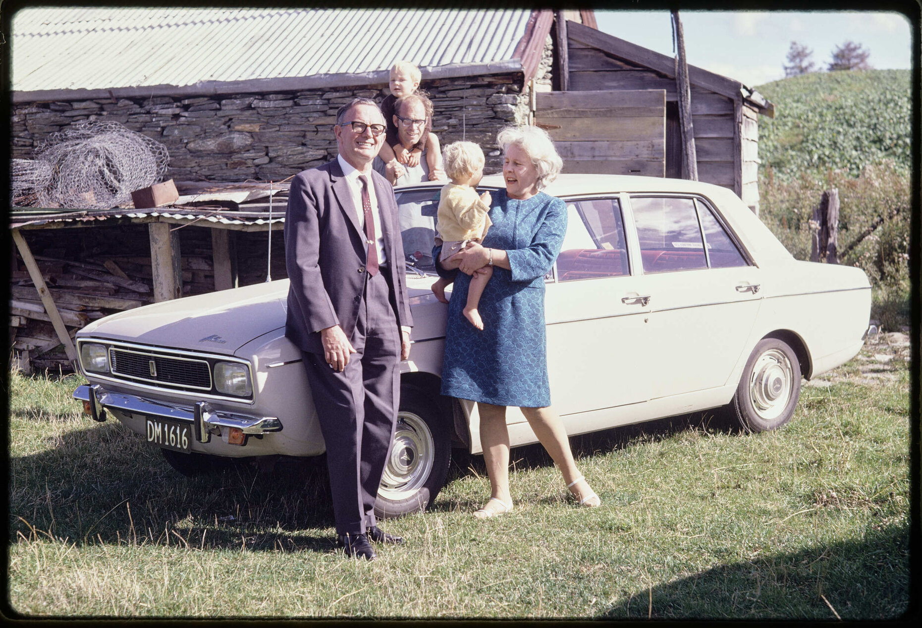 Sir John and Lady Walsh and family with Hillman Hunter car