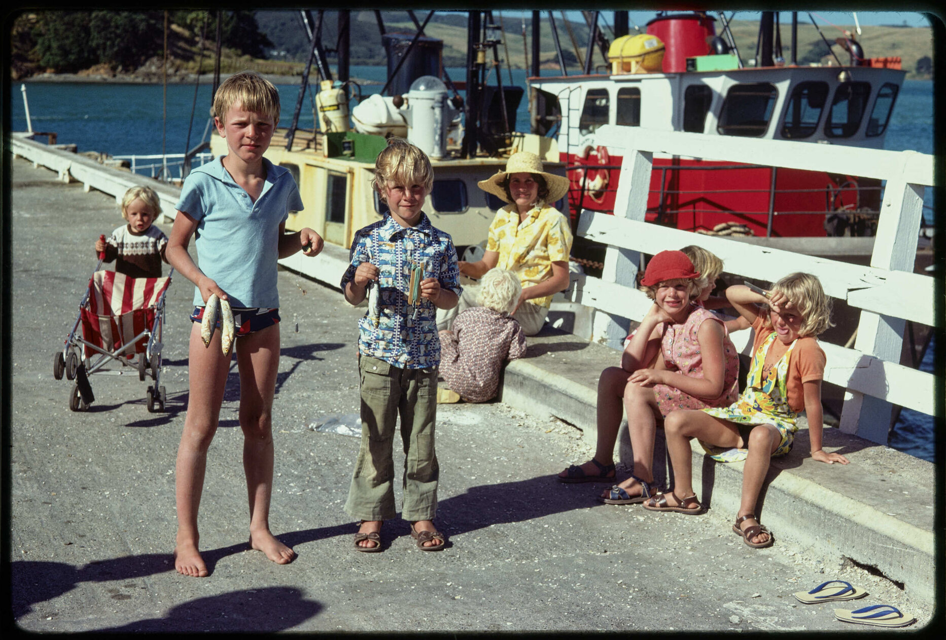 Children and Elizabeth Hanan at wharf