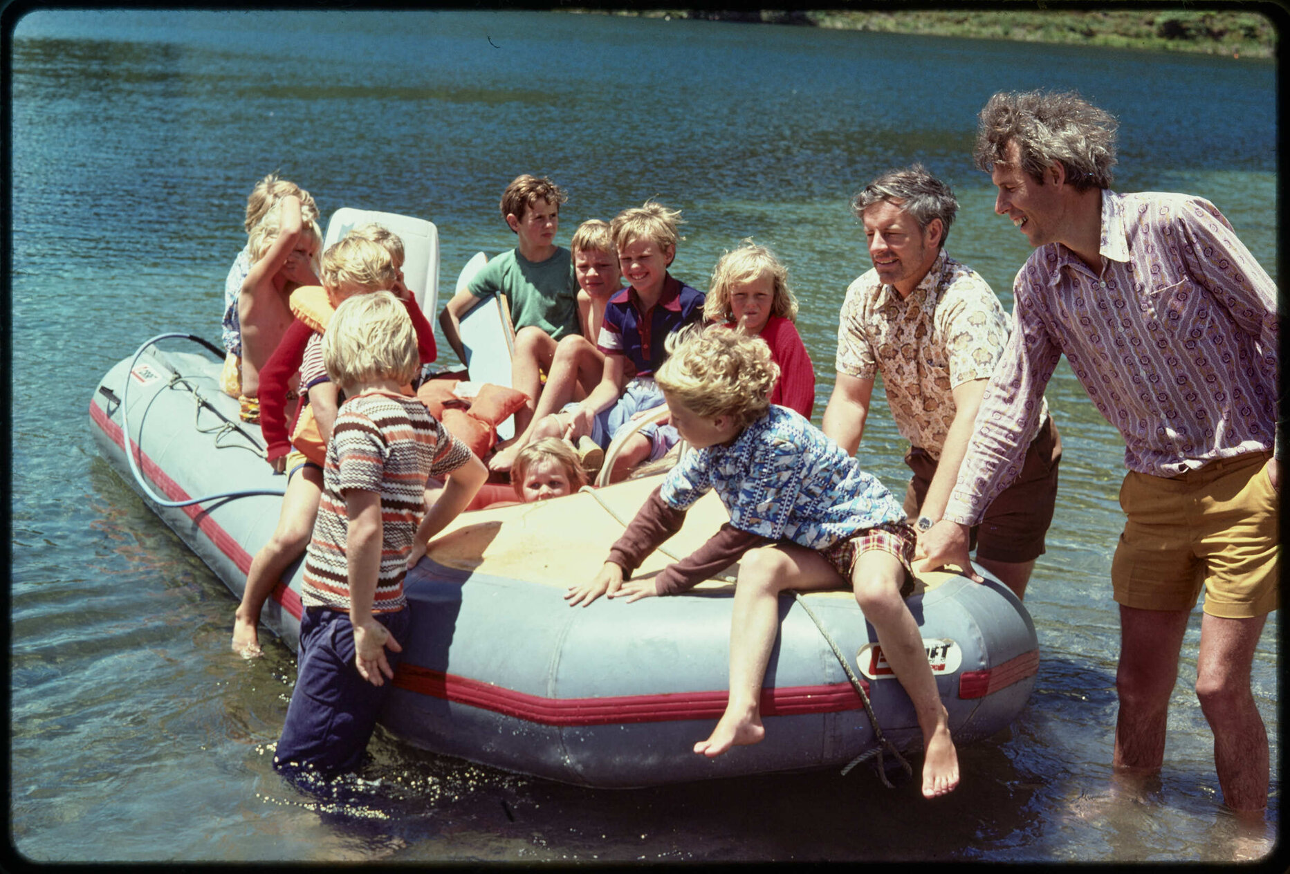 'Barry and Les pushing off boat'