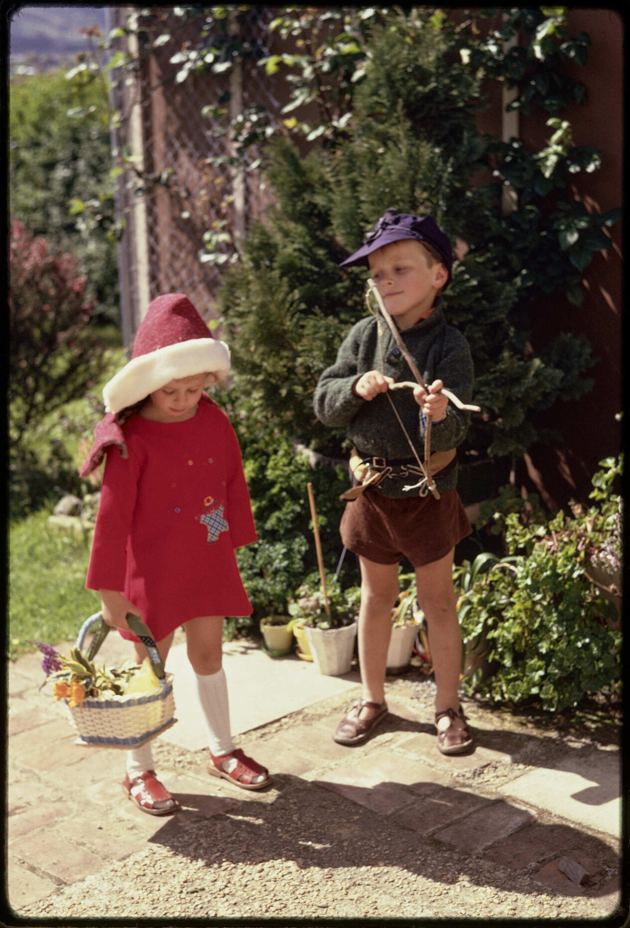 Alison and David Hanan, dressed as Red Riding Hood and Robin Hood for Kindy Fair