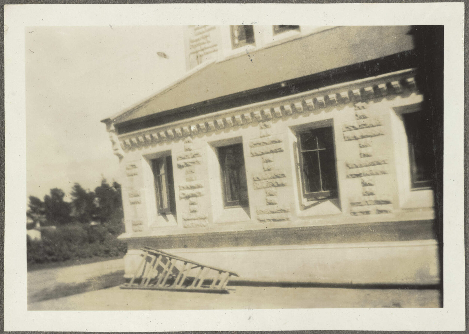 Corner of stone building with ladder