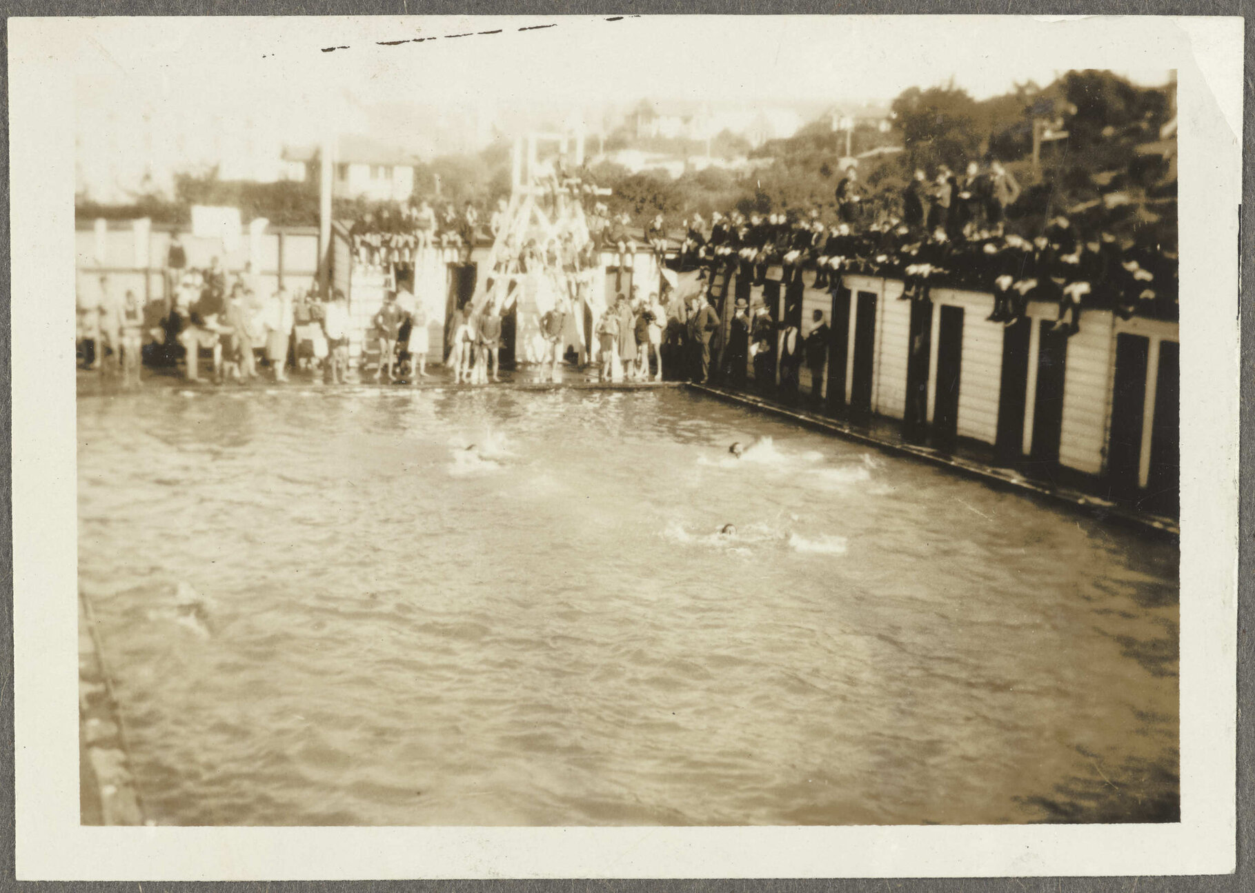 Swimming race with onlookers