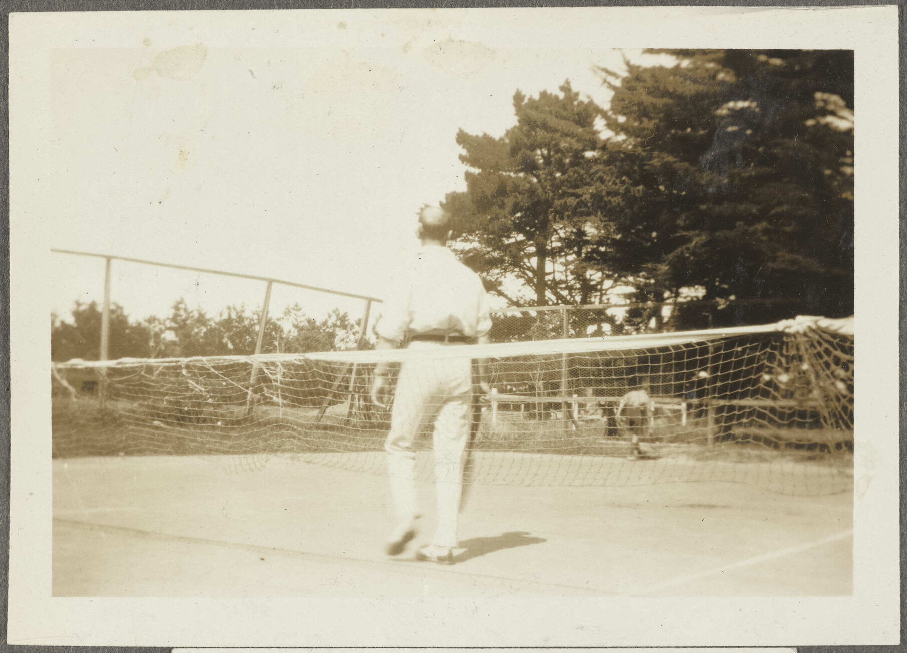 Man on tennis court