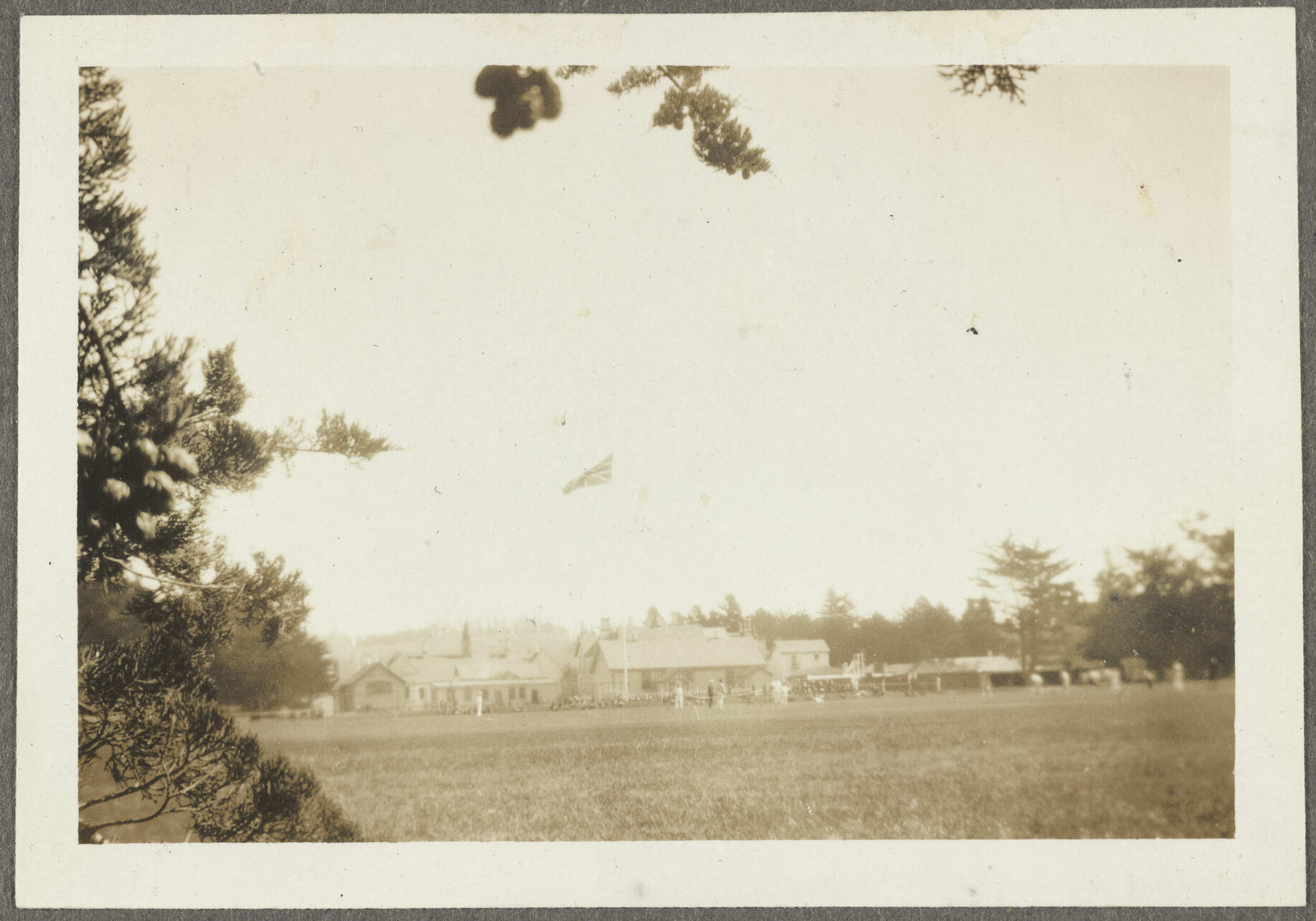 Cricket game [club rooms] flying Union Jack