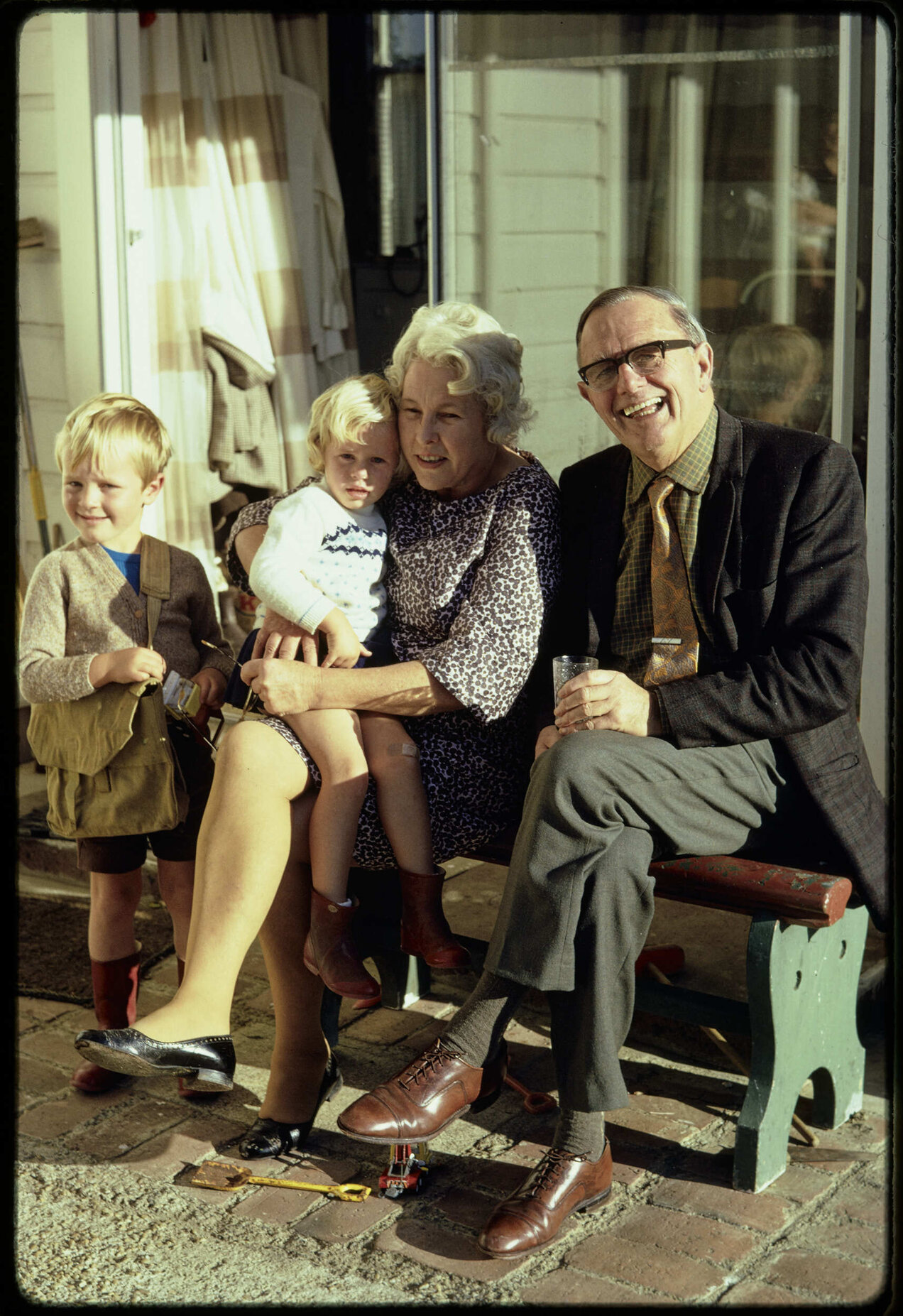 Lady Enid and Sir John Walsh with their grandchildren, David and Alison