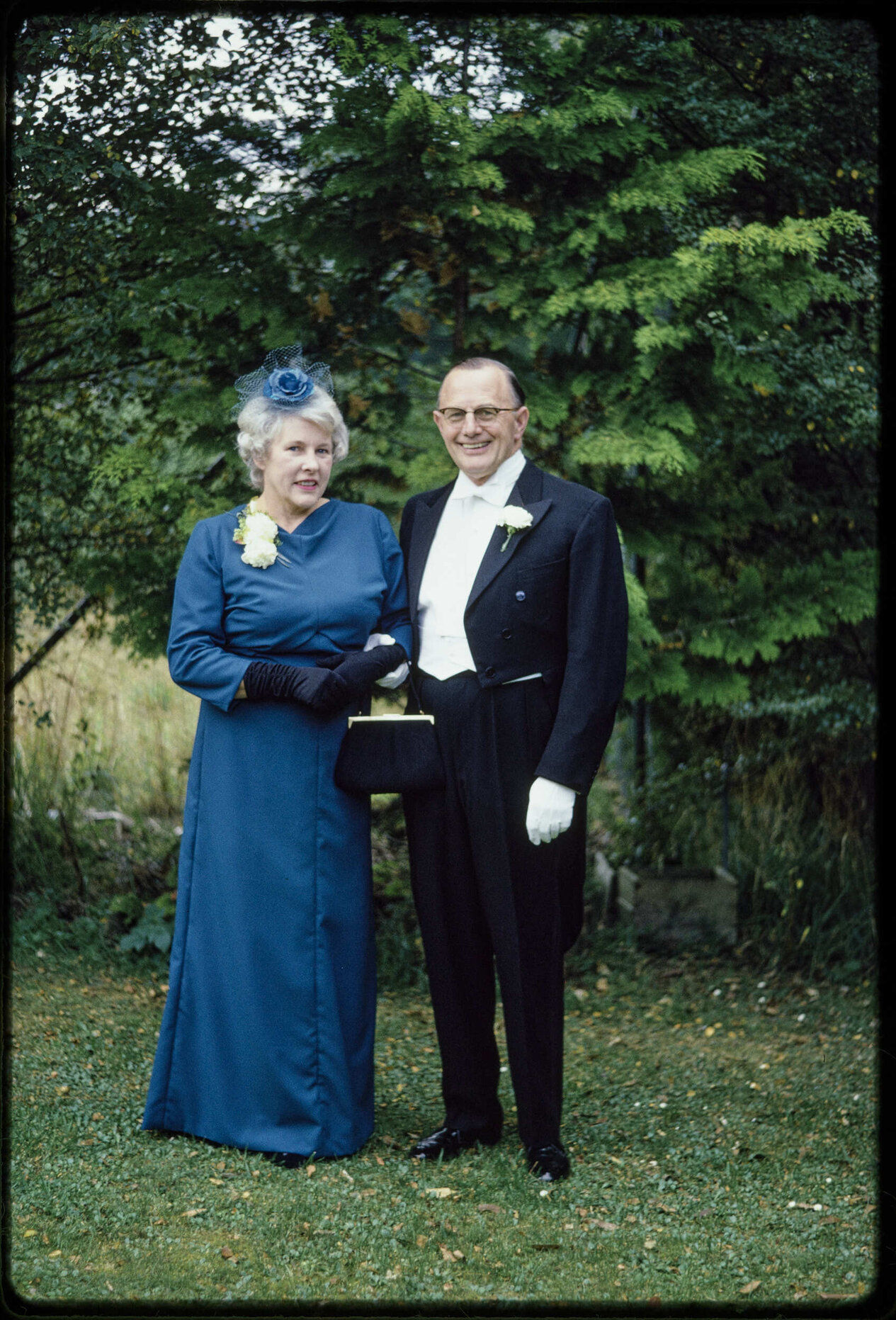 Lady Enid and Sir John Walsh, dressed for their daughter Elizabeth's wedding