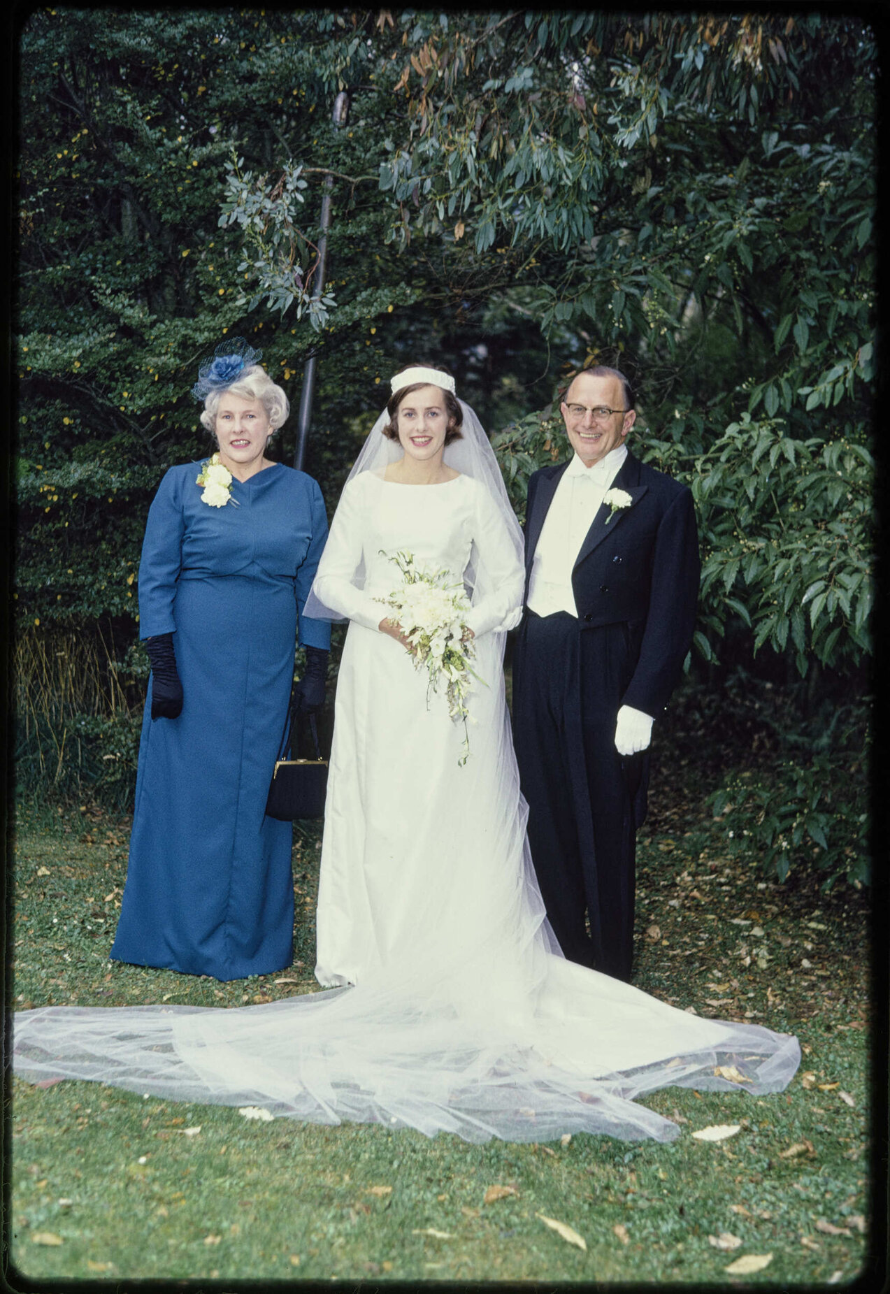 Elizabeth Hanan (Walsh) on her wedding day, with her parents Lady Enid and Sir John Walsh