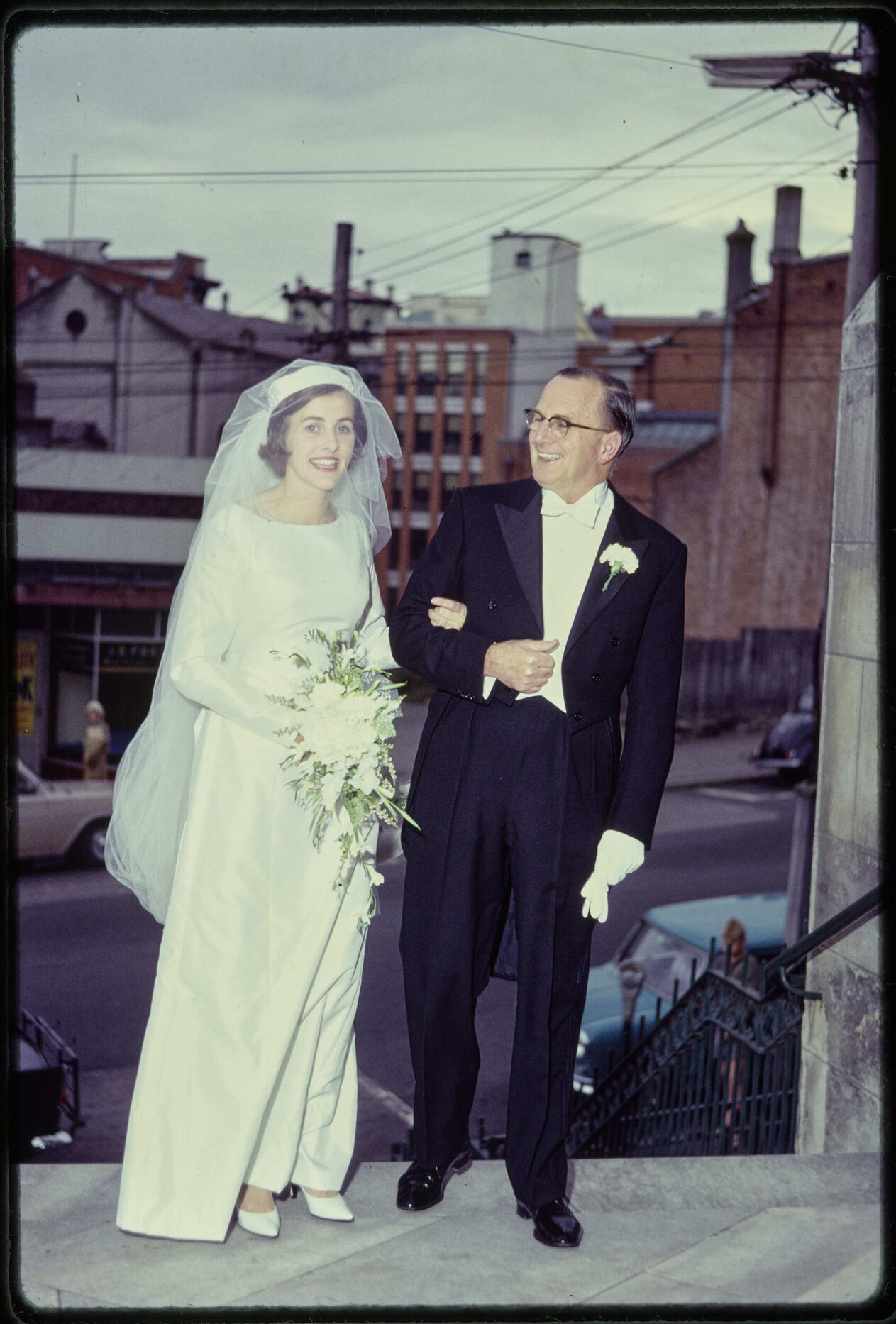 Elizabeth Walsh with her father on her wedding day, on the steps of St Paul's Cathedral
